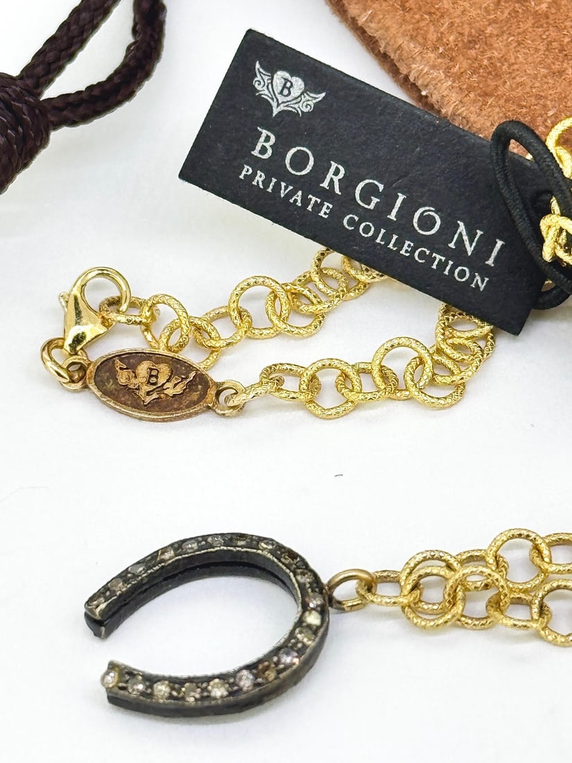 BORGIONI 14k Yellow Gold and Black Diamond Animal Spiral Necklace: Condition: Like New Brand: BORGIONI Material: 14K Yellow Gold Jewel: Black Diamond Black Diamond Count: 146 Round Black Diamond. Necklace Dimensions: 24 inches (Adjustable) Weight: 19 grams. Comes in