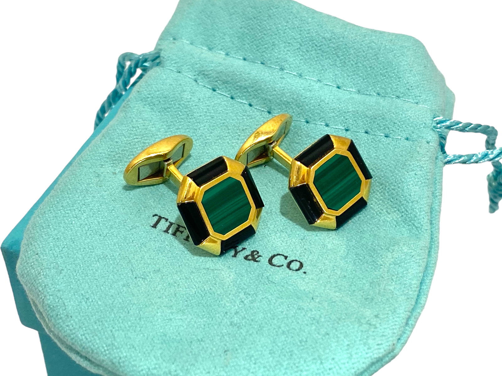 Tiffany & Co. 18k Yellow Gold Octagon Cut Malachite and Black Onyx Unique Cufflinks: Condition: Like New. Brand: Tiffany & Co. Metal: 18k Yellow Gold. Gemstone: Malachite and Black Onyx. Cufflinks Dimensions: Length: 1" Width: 0.65". Weight: 17.5 grams