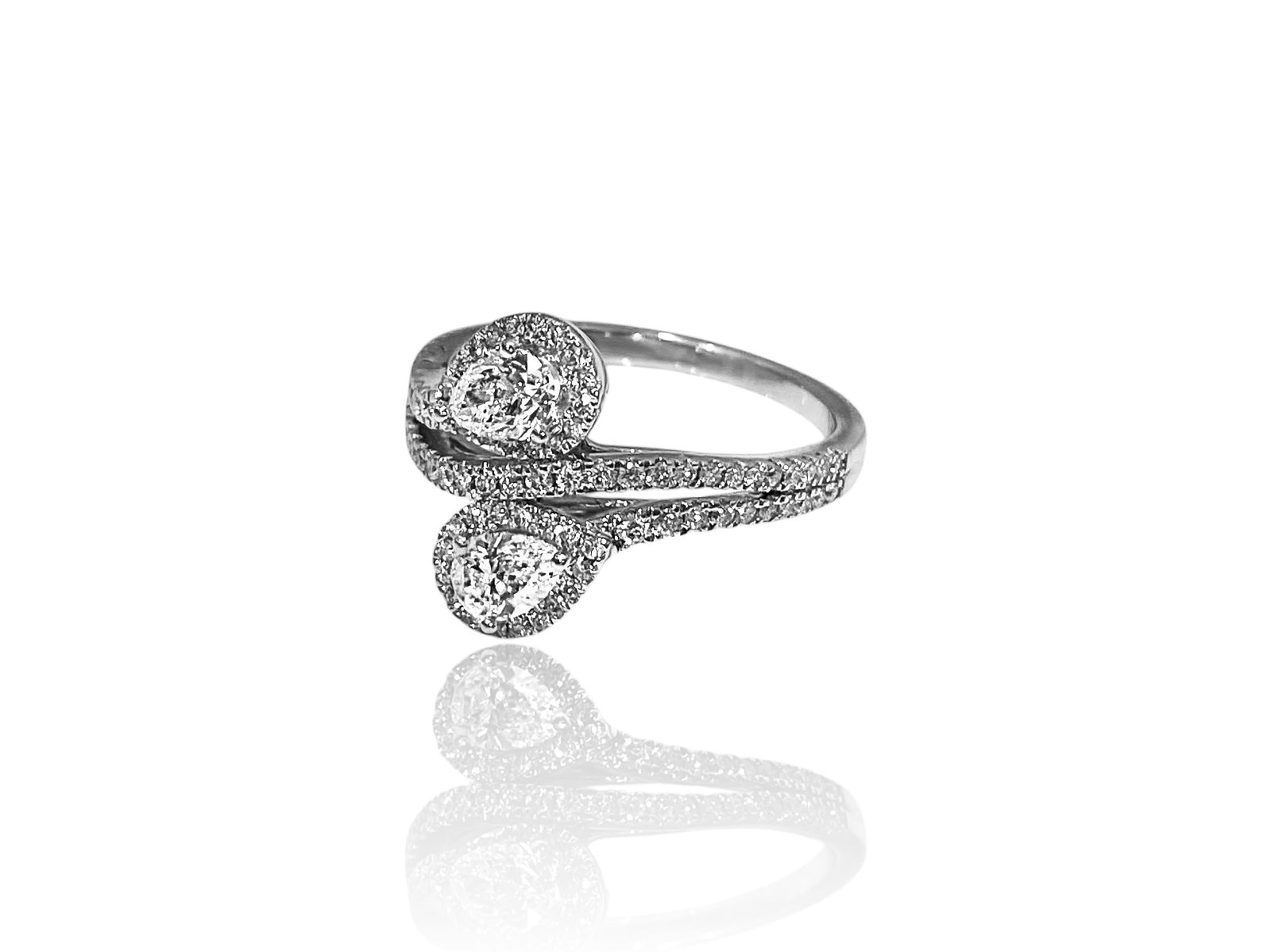 Pear Shaped Diamond "Ever Us" 2 Stone Engagement Ring in 14K White Gold: Condition: Excellent. Creator: Ever Us. Metal Purity: 14k White Gold Jewel: Diamond. Stone Cut: Pear-Cut and Round-cut. Jewel Count: 88. Total Carat Weight: APX 2 CARAT. Clarity & Color: VS2-SI1; G-H.