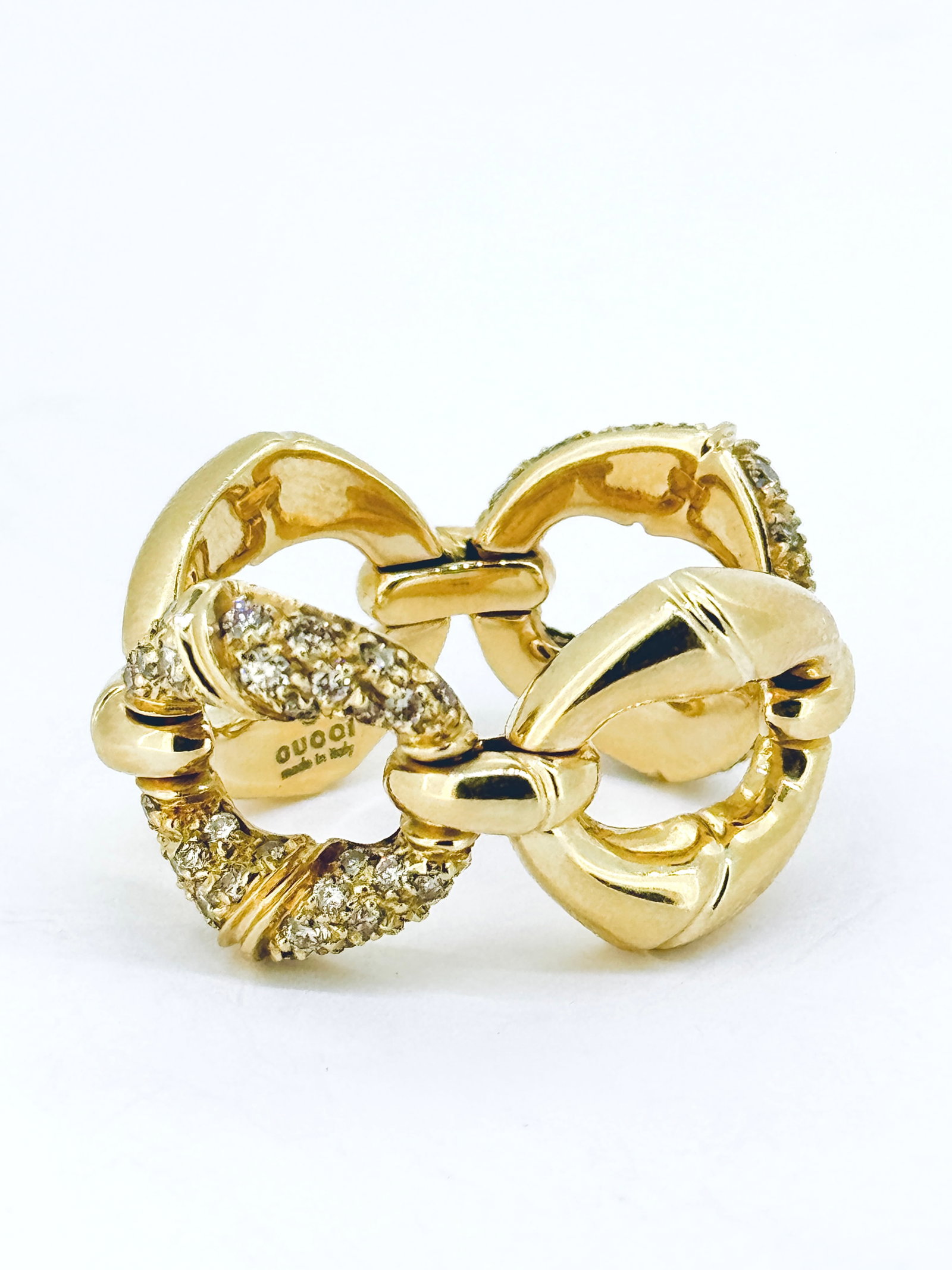 Exquisite Gucci Bamboo Collection Diamond Ring in 18K Yellow Gold: Condition: Like New. Brand: GUCCI. Material: 18k Yellow Gold. Jewel: 88 Round-brilliant-cut Diamond. Ring Size: 7.25 Hallmark: " GUCCI" " MADE IN ITALY" Weight: 14 grams.