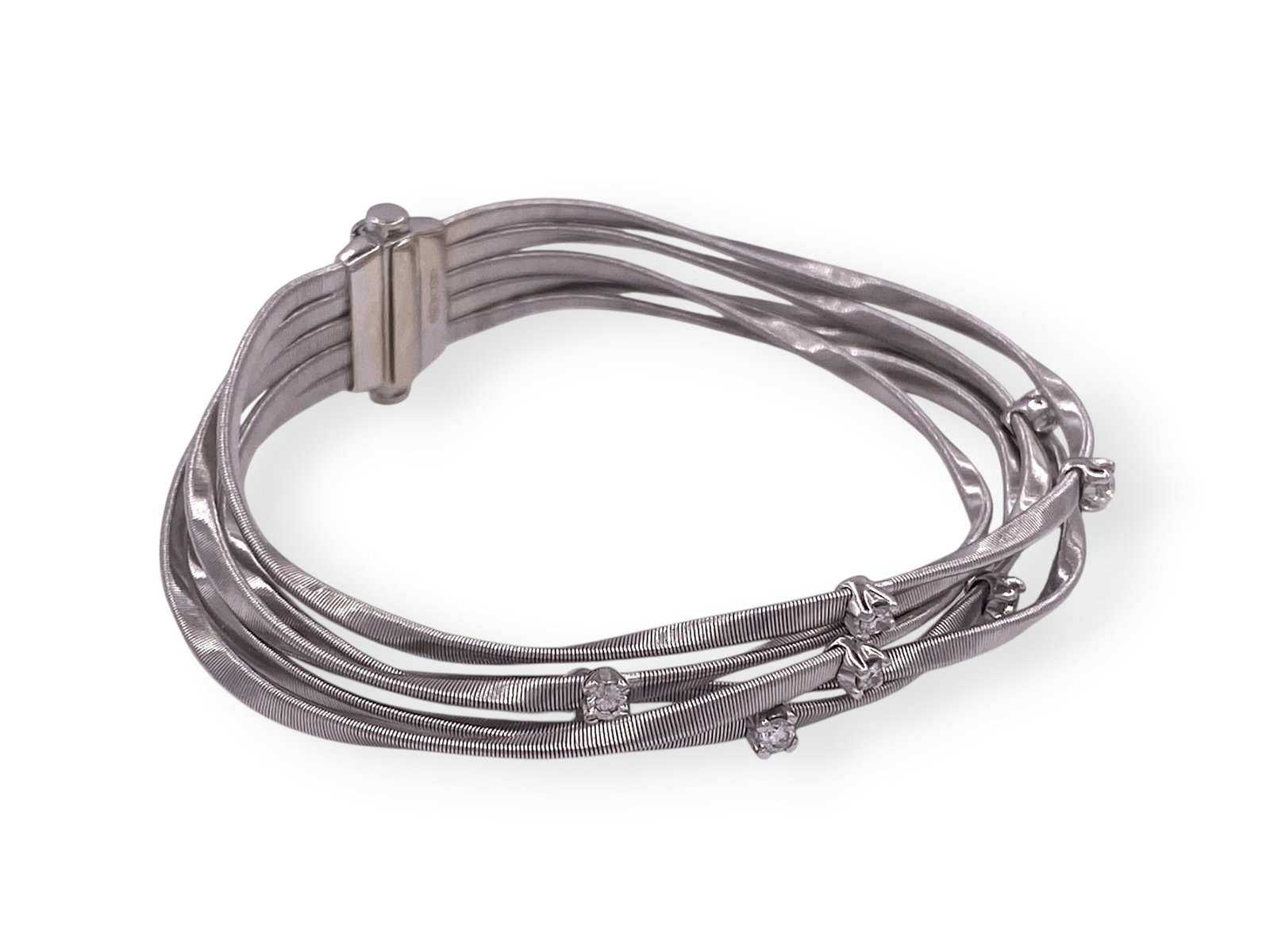 Marco Bicego Marrakech Yellow Gold 5 Strand Diamond Bracelet: Item: Bracelet Designer/maker: Marco Bicego Style: Marrakech Collection Metal: 18K White Gold Total weight: 27.8 grams Bracelet width: 11mm Size: Will fit up to 7.5" Wrist Diamonds: 9 Natural Round Br