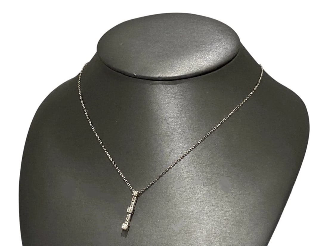 14k White Gold Pendant, w 3 Center & 8 Accent Natural Diamonds, Chain size 18": Item: Necklace / Pendant Metal: 14K White Gold Pendant size: 24mm x 3.5" mm x 4.5 mm Diamonds; total 11 Natural Round cut stones, Approx: 0.50 tcw. H-I Color, SI1-SI2 Clarity Pendant has an engraving 