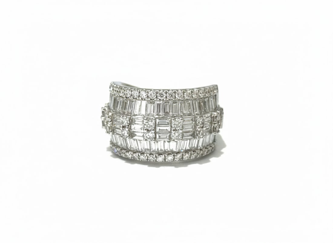 3.20 TCW Round and Baguette Diamond Wedding Band Ring in 18k White Gold: Condition: Like New Brand: Unbranded Type: Band Ring Base Metal: 18k White Gold Gemstone: Diamond Total Carat Weight: 3.20 TCW Color: F Clarity: VS1-VS2 Round Diamond count: 54 Round Brilliant Cut Dia