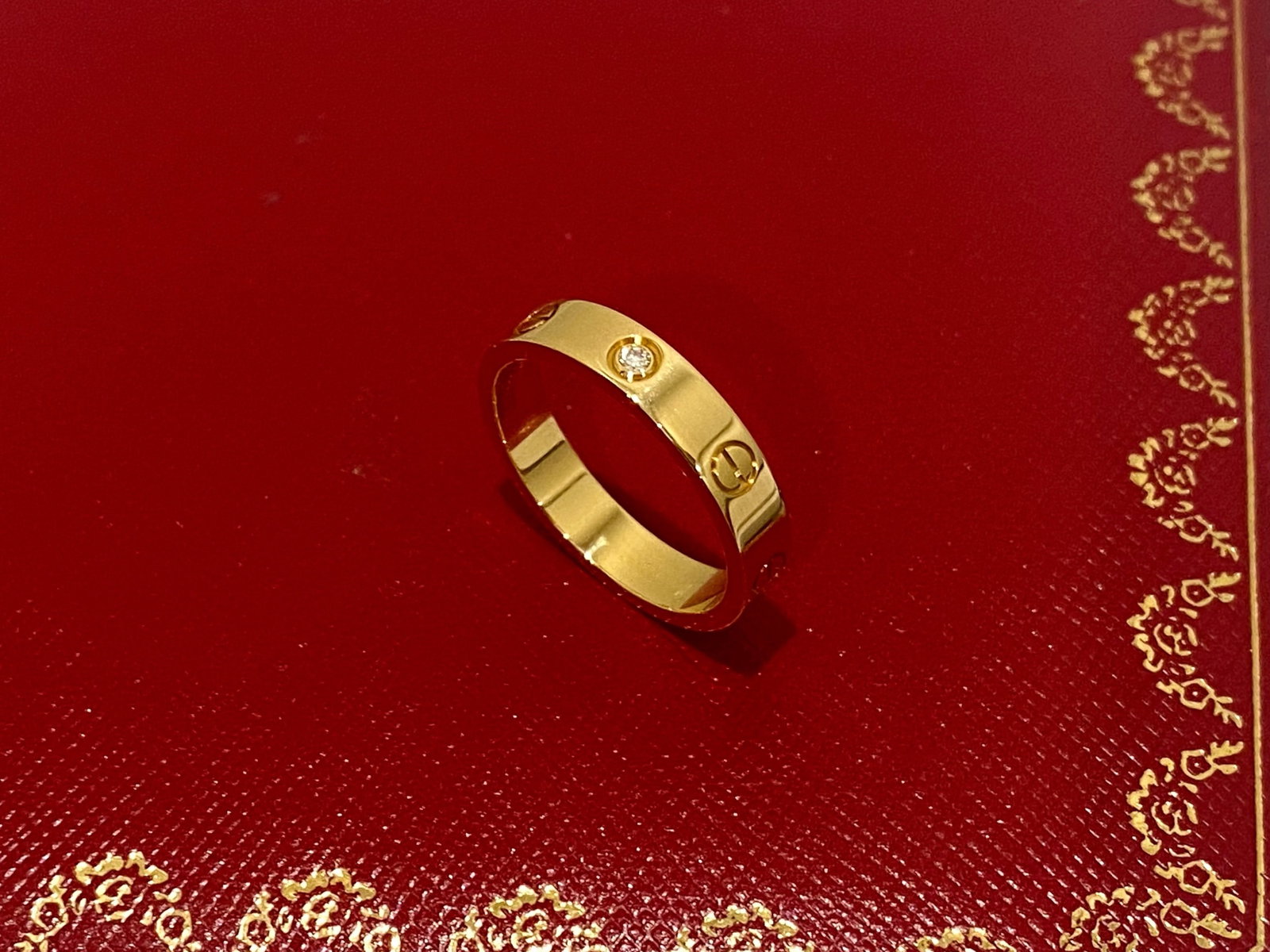 Cartier Love Ring, One Diamond 18k yellow gold, size 55: Cartier Love Ring, One Diamond 18k yellow gold, size 55 Condition: like new. Brand: Cartier Metal: 18k Yellow gold. Diamond: set with 1 brilliant-cut diamond totaling 0.02 carats. Ring size: 55
