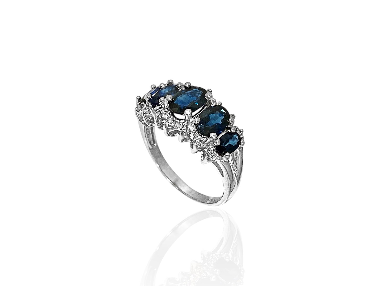 Blue Sapphire and Diamond Frame Five Stone Ring in 14K White Gold: Condition: Like New Brand: Unbranded.
