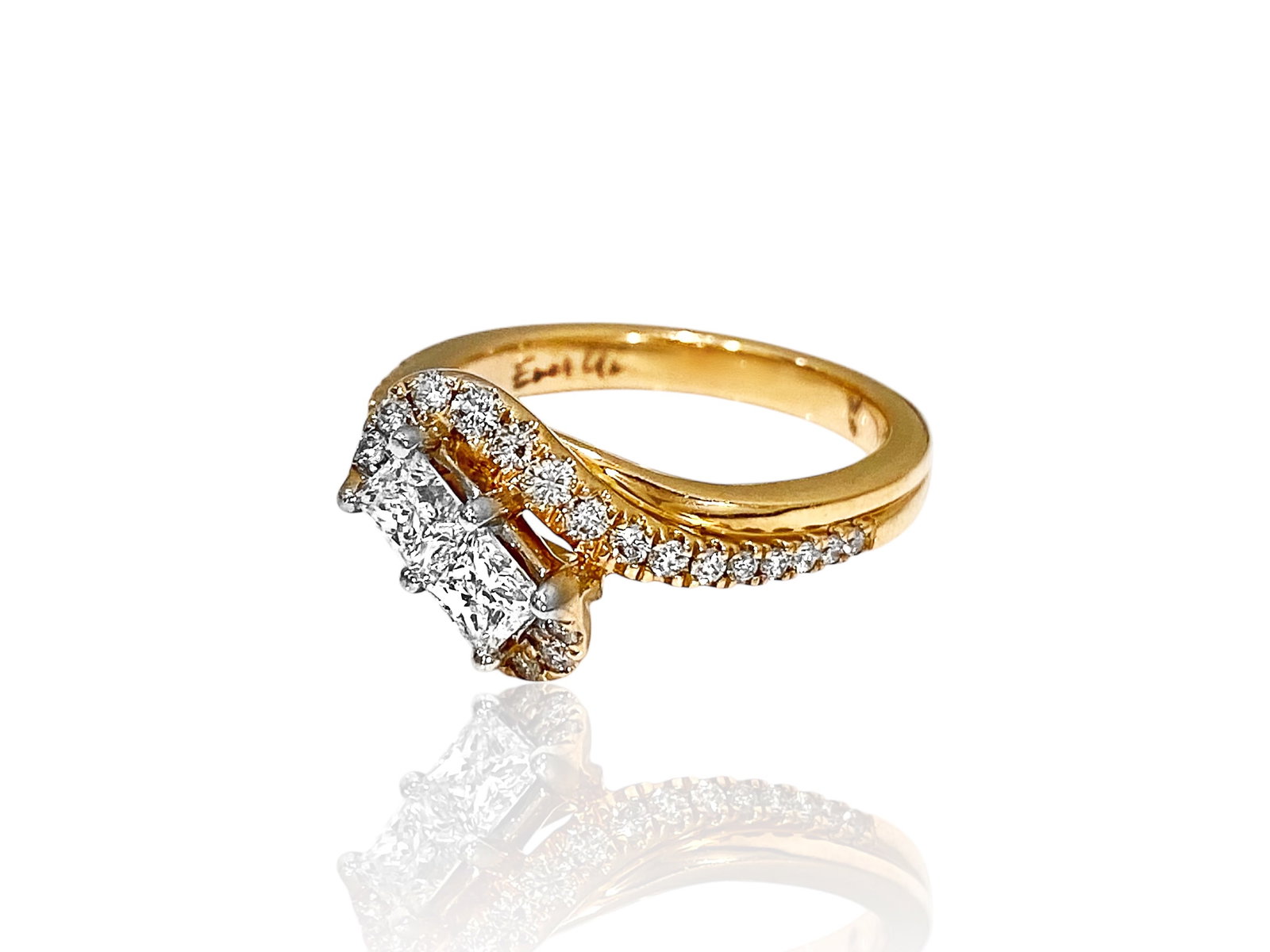Ever Us Princess-Cut and Round Diamond Two Stone Bypass Ring in 14K Rose Gold: Condition: Excellent. Creator: Ever Us. Metal Purity: 14k Rose Gold Jewel: Diamond. Stone Cut: Princess-cut and Round Brilliant-cut. Total Carat Weight: OVER 1 TCW. Clarity & Color: SI1-SI2; H-I. Jewe