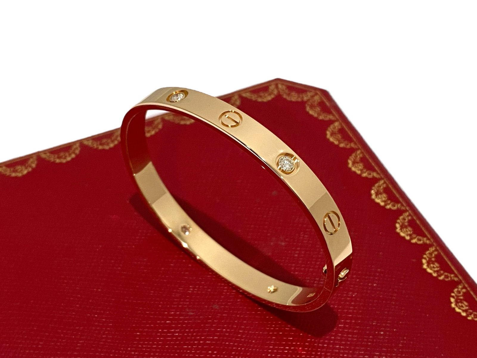 Cartier Love Bracelet 4 Diamond 18K Rose Gold Size 16: Condition: Like New Brand: Cartier Material: 18K Rose Gold Gemstone: Diamond Diamonds: Set with 4 brilliant-cut diamonds totaling 0.42 carats. Size: 16 Retail Price: $13,700 Comes in Original Box or P