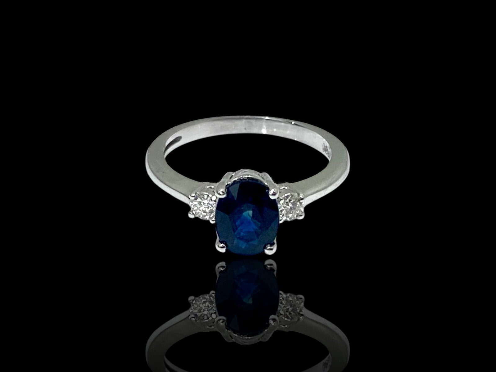 EFFY Oval Sapphire and Round Diamond Ring in 14k White Gold: Condition : Like New Brand : EFFY. Metal: 14k White Gold. Gemstone: Oval Sapphire and (2) Round Diamond. Sapphire Dimension: 8.5mm x 6.5mm Ring Size: 6.75 Weight: 3.2 grams.