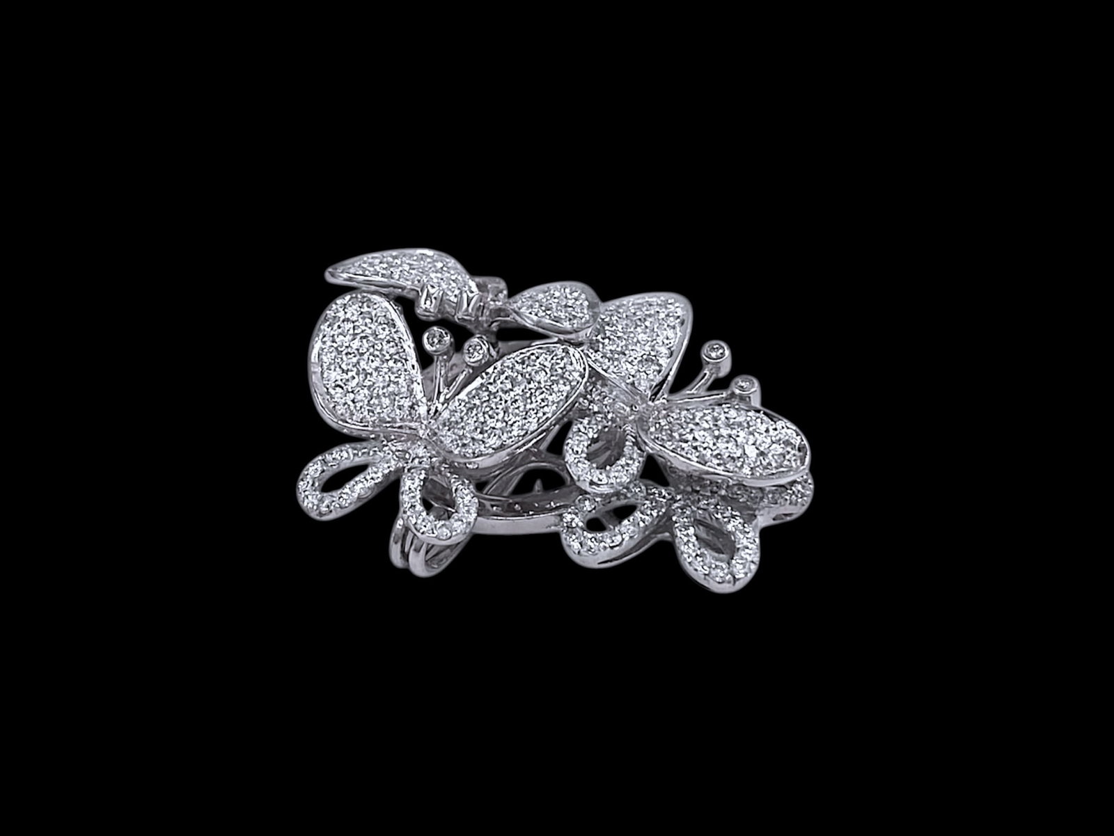 Classic Butterfly Triple Pave Diamond Pin Brooch in 14k White Gold: Item: Pin Brooch. Brand: Unbranded. Metal: 18K White Gold. Total weight: 8.4 grams. Stone: Brilliant Round-cut Diamonds. Diamond Count: 192 stones. Total Carat Weight: 4.5TCW. Clarity and Color: SI1 S