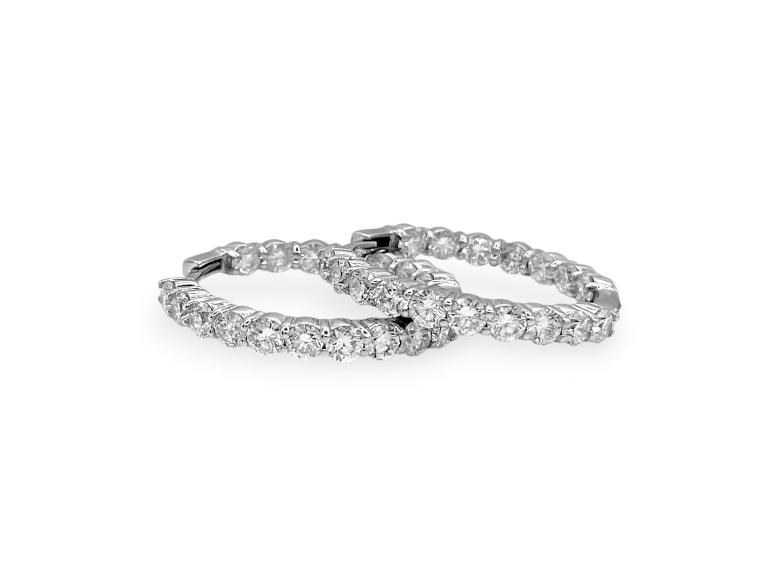 Inside Out Round Natural Diamond Hoops Earrings in 14K Yellow Gold 7.50 CT.TW: Item: Bracelet. Brand: Unbranded. Style: Inside Out Round Hoops. Metal: 14K White Gold. Total weight: 13.3 grams. Earrings Diameter: 1.1" inches. Diamonds: 34 Natural Round Brilliant-cut Stones. Total