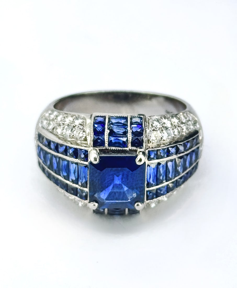 18k White Gold Natural Blue Sapphire and Round Diamond Cocktail Ring: Condition: Like New Designer: Unbranded Material: 18K White Gold Stone: Natural Blue Sapphire and Diamond. Center Main Stone: 1.5Carat Square-cut Sapphire Diamond Carat weight: 2TCW Sapphire Dimension
