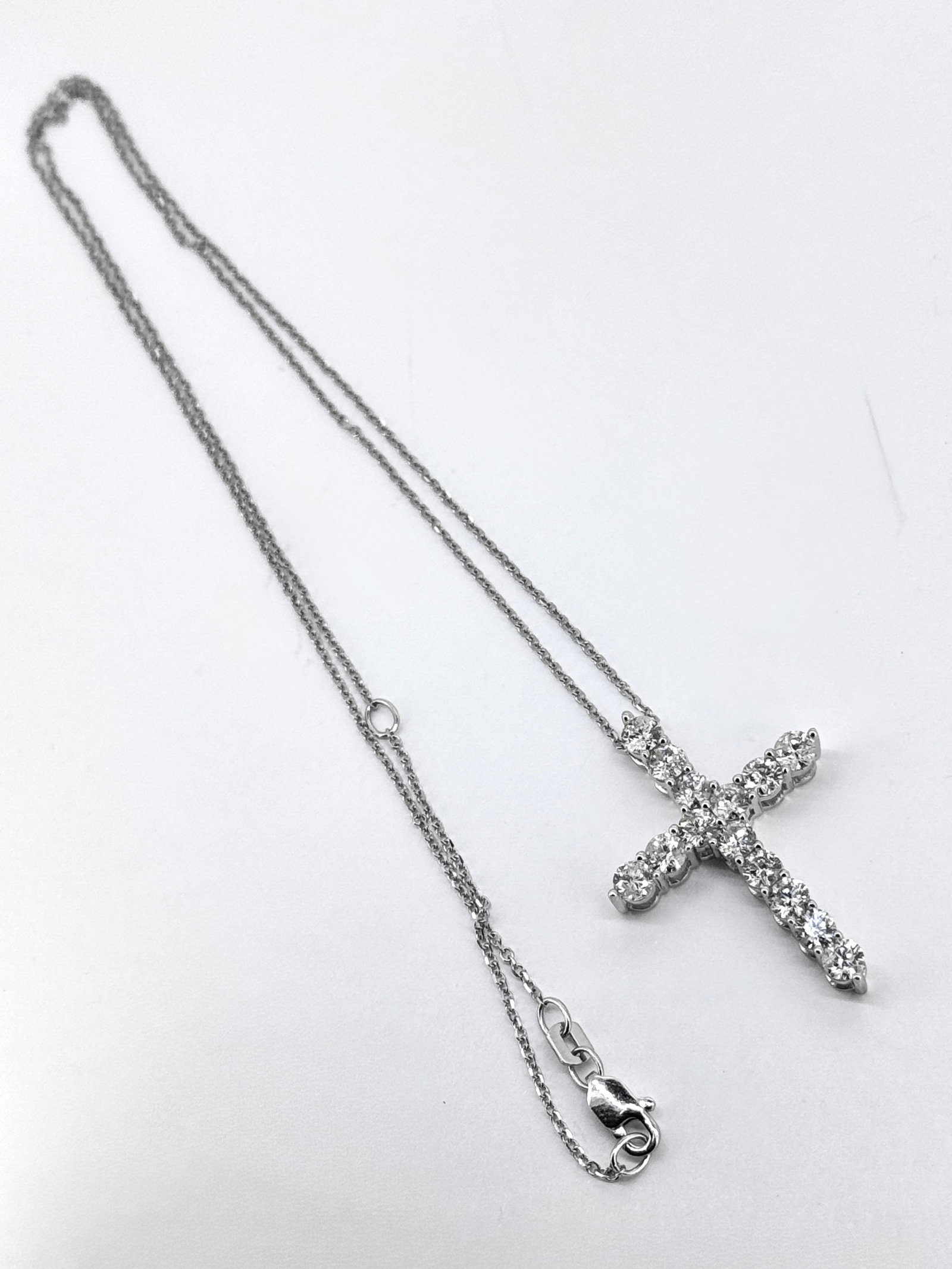 2CT.TW Diamond Cross Pendant Necklace in 14k White Gold: Condition: Like New. Brand: Unbranded. Material: 14k White Gold. Gemstone: Round-cut Diamond Total carat weight: 2 TCW. Color & Clarity: SI1-SI2; I-J Diamond Count: 14. Pendant dimensions: 0.9" x 1.3"