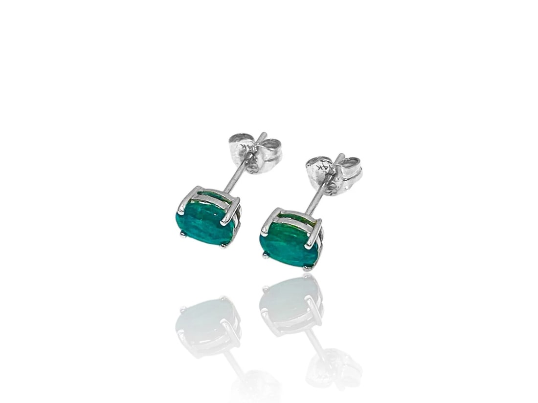 1.20 Tct Oval Cut Natural Emerald Push Back Stud Earring 14K Solid White Gold: Item: Pair of Natural Emerald Stud Earrings Stone shape: Oval Stone Measurements: 6 mm x 4 mm Each Total Carat Weight: 1.20 ct Metal: 14K white gold Style: Post with butterfly push backs Total weight: