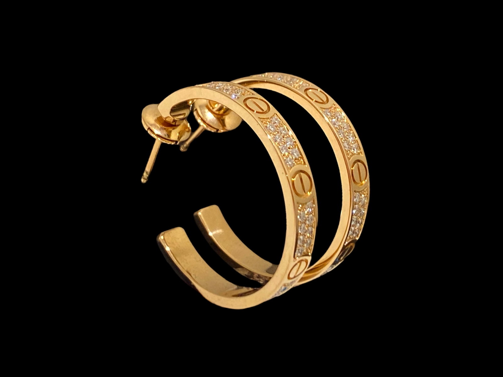 Cartier Love earrings 18kt Rose Gold and Pave Diamond, Hoop earrings: Cartier Love earrings 18kt Rose Gold and Pave Diamond, Hoop earrings Love earrings, rose gold 750/1000, each set with 48 brilliant-cut diamonds totalling 0.51 carat. Condition: Like new Brand: Cartier