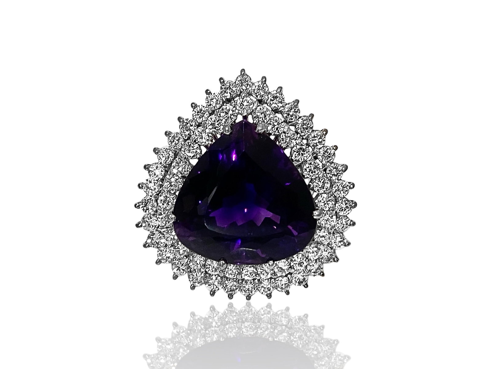 Vibrant Natural Pear Amethyst and Diamond Cocktail Ring In 14k White Gold: Condition: Like New Brand: Unbranded. Metal: 14K White Gold. Center Stone: Amethyst and Round Brilliant-cut Diamond. Amethyst Dimensions: 18mm x 18mm. Diamond Count: 64 Stones. Ring Size: 5.5. Weight: