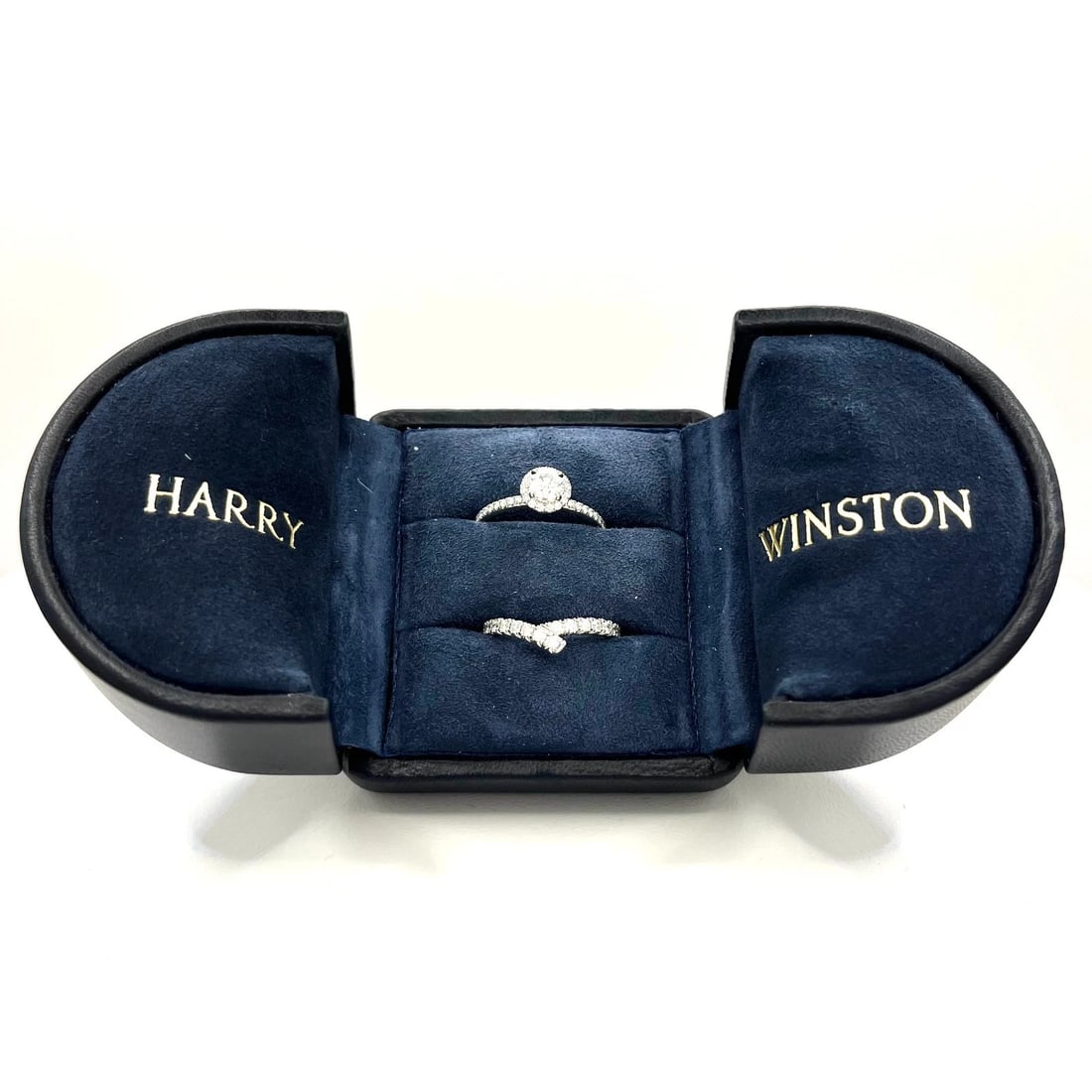 Harry Winston Set of Engagement (0.53 ct) & Ribbon Diamond Wedding Band. Sz 6: Item: Engagement Ring & Ribbon Band. Designer/Maker: HARRY WINSTON. Metal: Platinum 950. Total weight: 7.0 grams Engagement Ring Specifications: Diamonds: 1 Natural Round Brilliant-cut Center Stone an