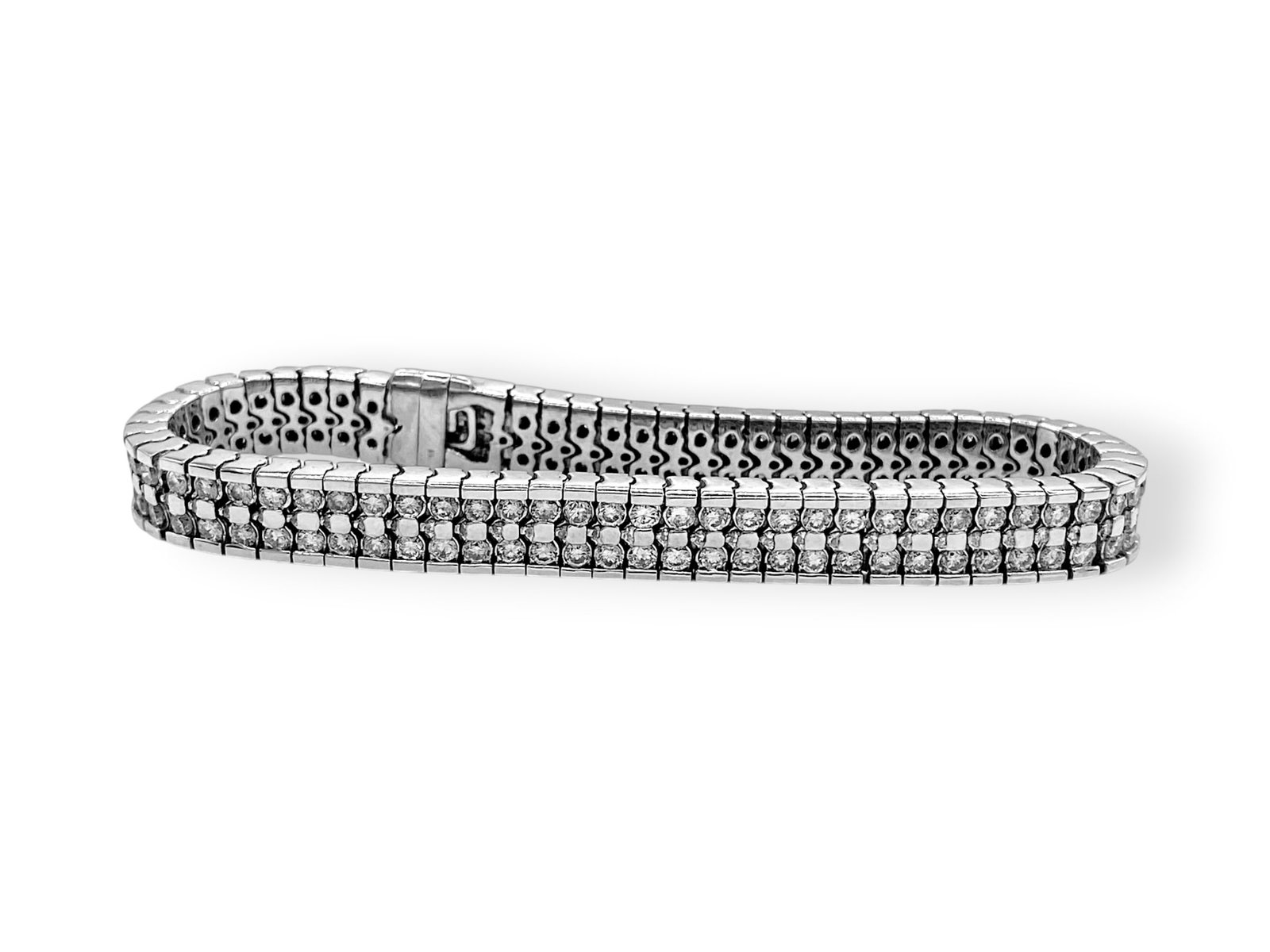 Classic 8.0TCW Natural Diamond Two-row Unisex Bracelet in 14k White Gold: Item: Bracelet. Brand: Unbranded. Metal: 14K White Gold. Total weight: 38.5 grams. Bracelet Dimensions: Length: 7" inches; Width: 8mm. Diamonds: 140 Natural Round Brilliant-cut Stones. Total carat Wei