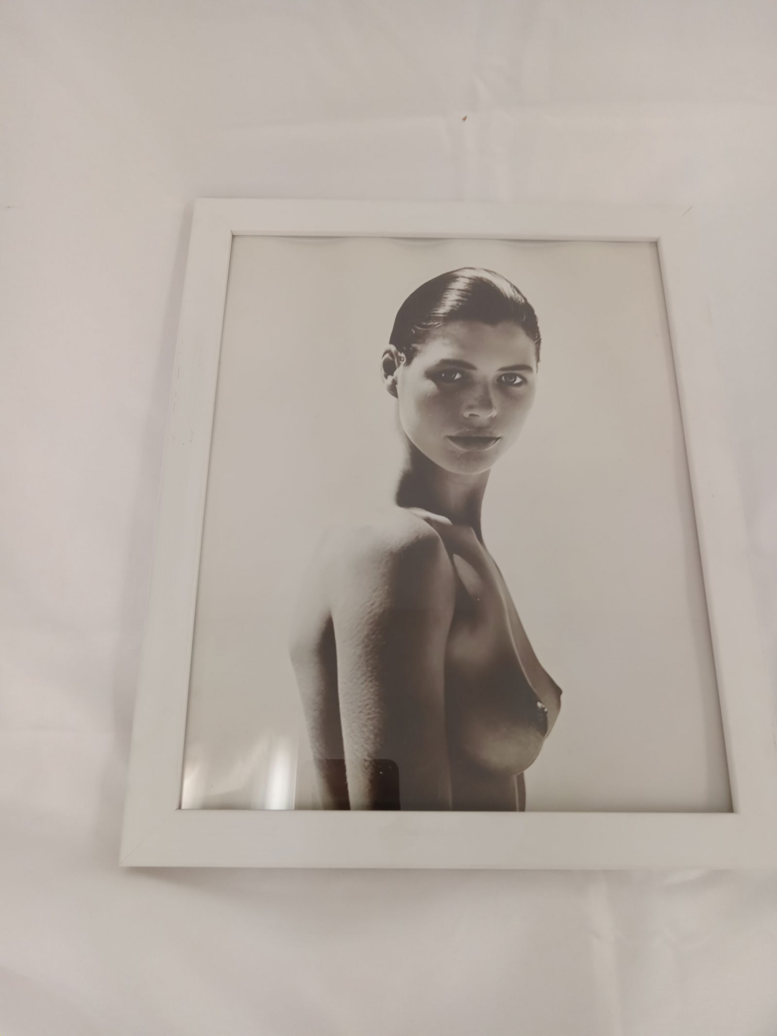 Herb Ritts "Carrie, Paradise Cove, 1988," Framed Print: Herb Ritts "Carrie, Paradise Cove, 1988," photo print on high gloss Kodak photo paper, framed, measures 8x10 inches.