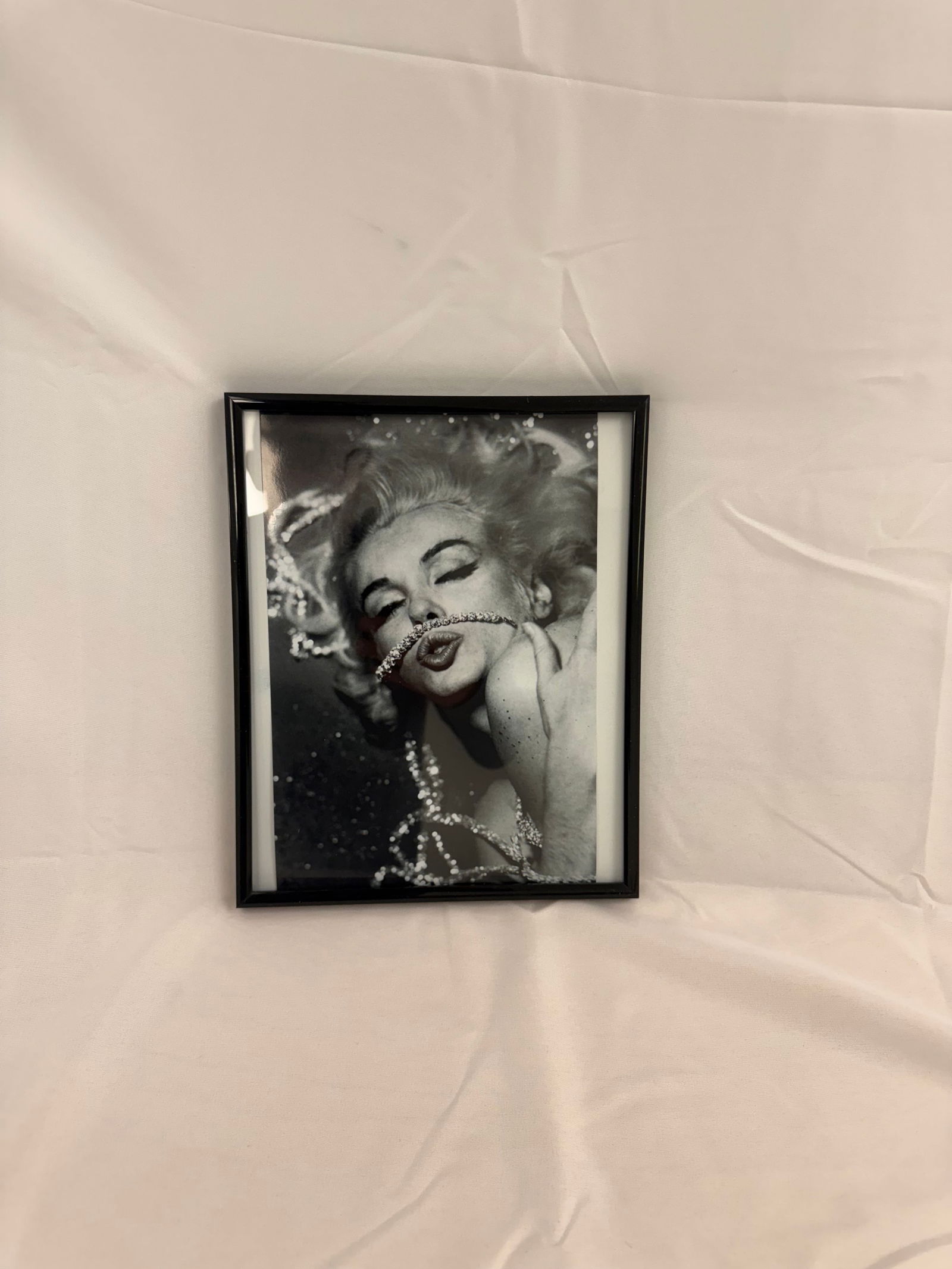BERT STERN: MARILYN MONROE KISS RHINESTONES: BERT STERN: MARILYN MONROE KISS RHINESTONES. Image: 8x10 inches on Kodak photo paper. In June 1962, photographer Bert Stern shot a series of photos of Marilyn Monroe at the Hotel Bel-Air that have