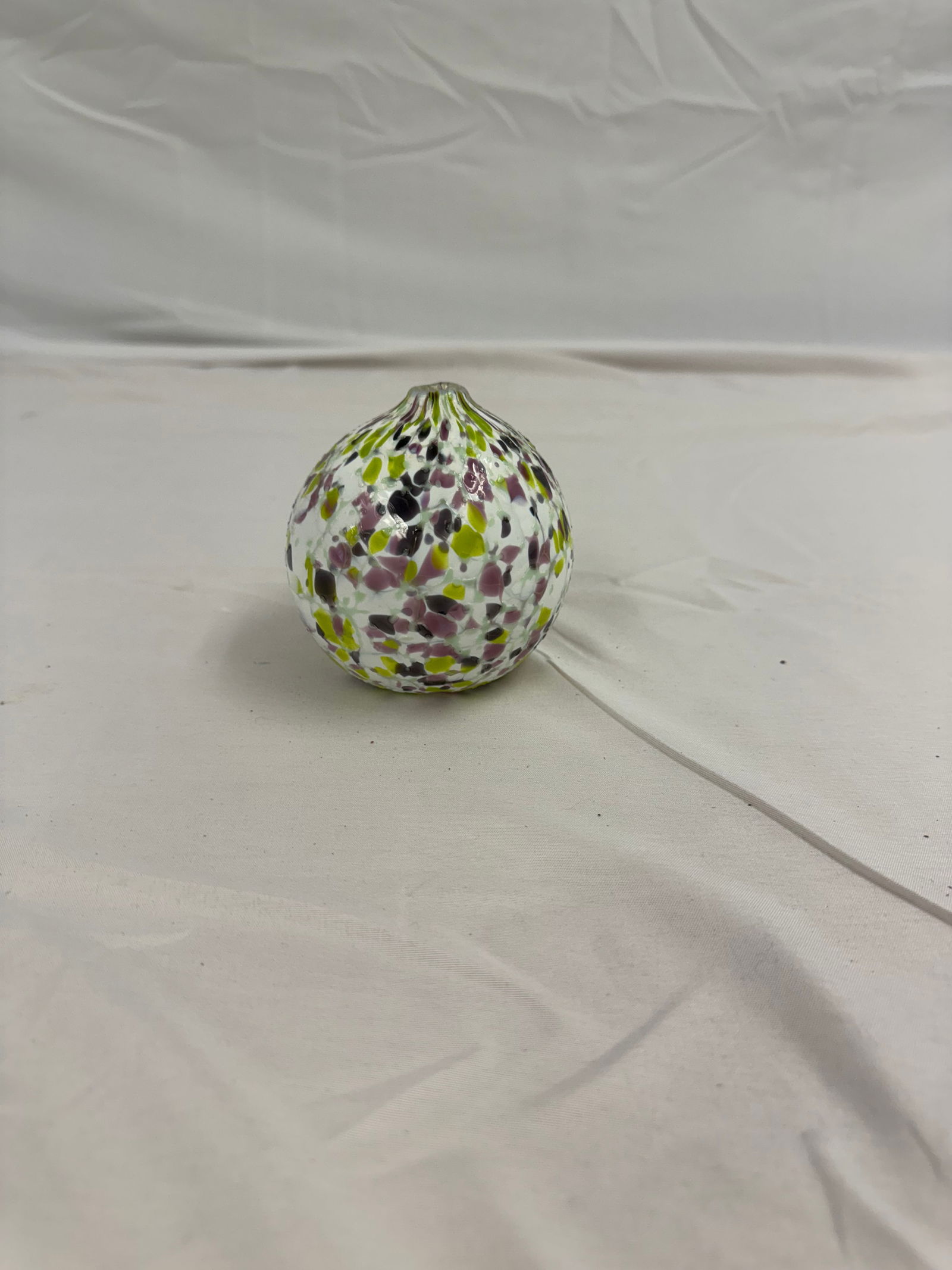 Antique Hand Blown Glass Ball shaped Vase: Hand blown Glass vase. Marbled and speckled details. Measures 3inches in diameter.