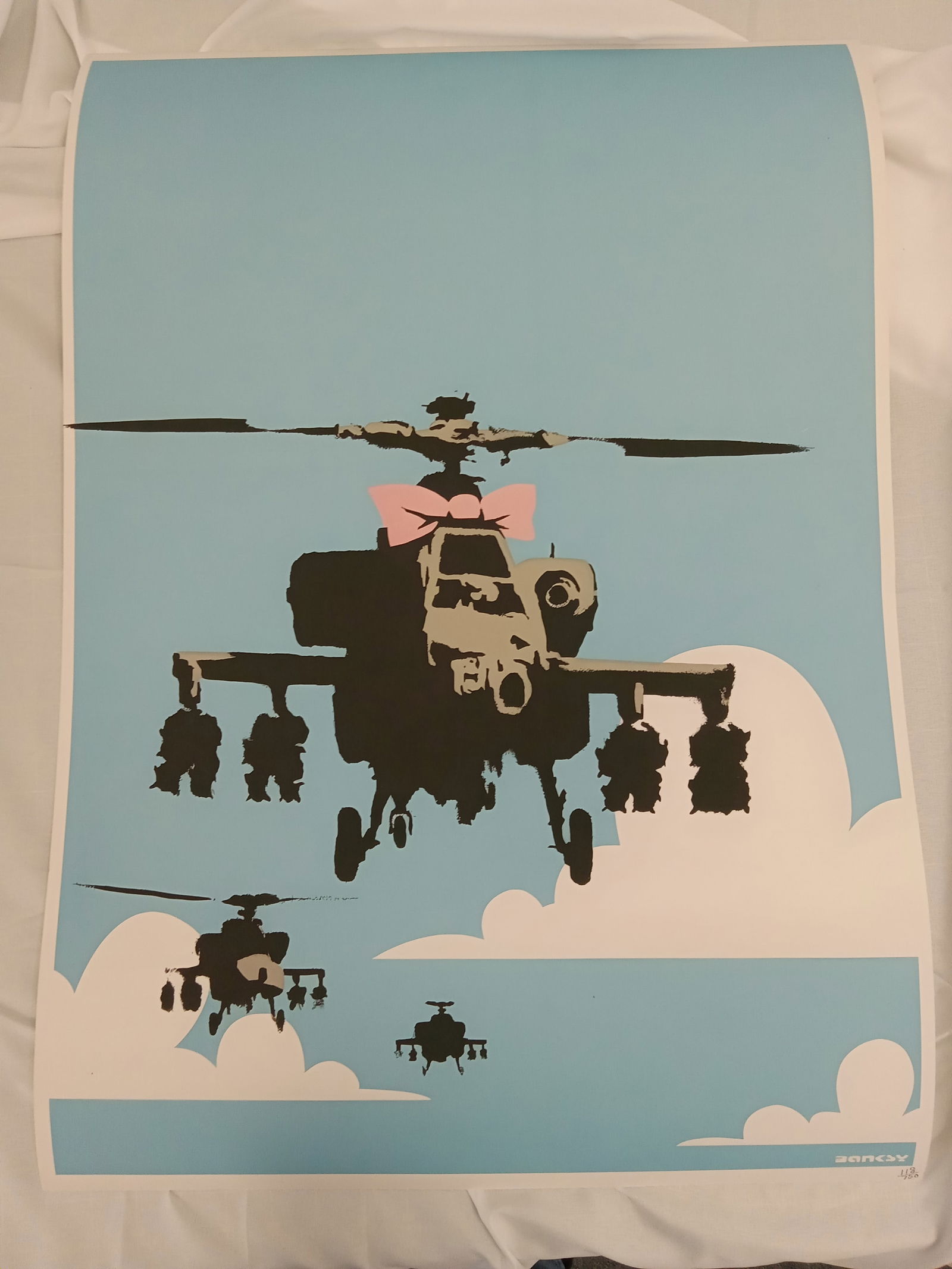 Banksy "Happy Chopper" Signed Print: Banksy "Happy Chopper" signed print on wove paper. Signed and numbered in pencil. Unknown print date. Measures 27 3/8 x 19 1/2 inches.