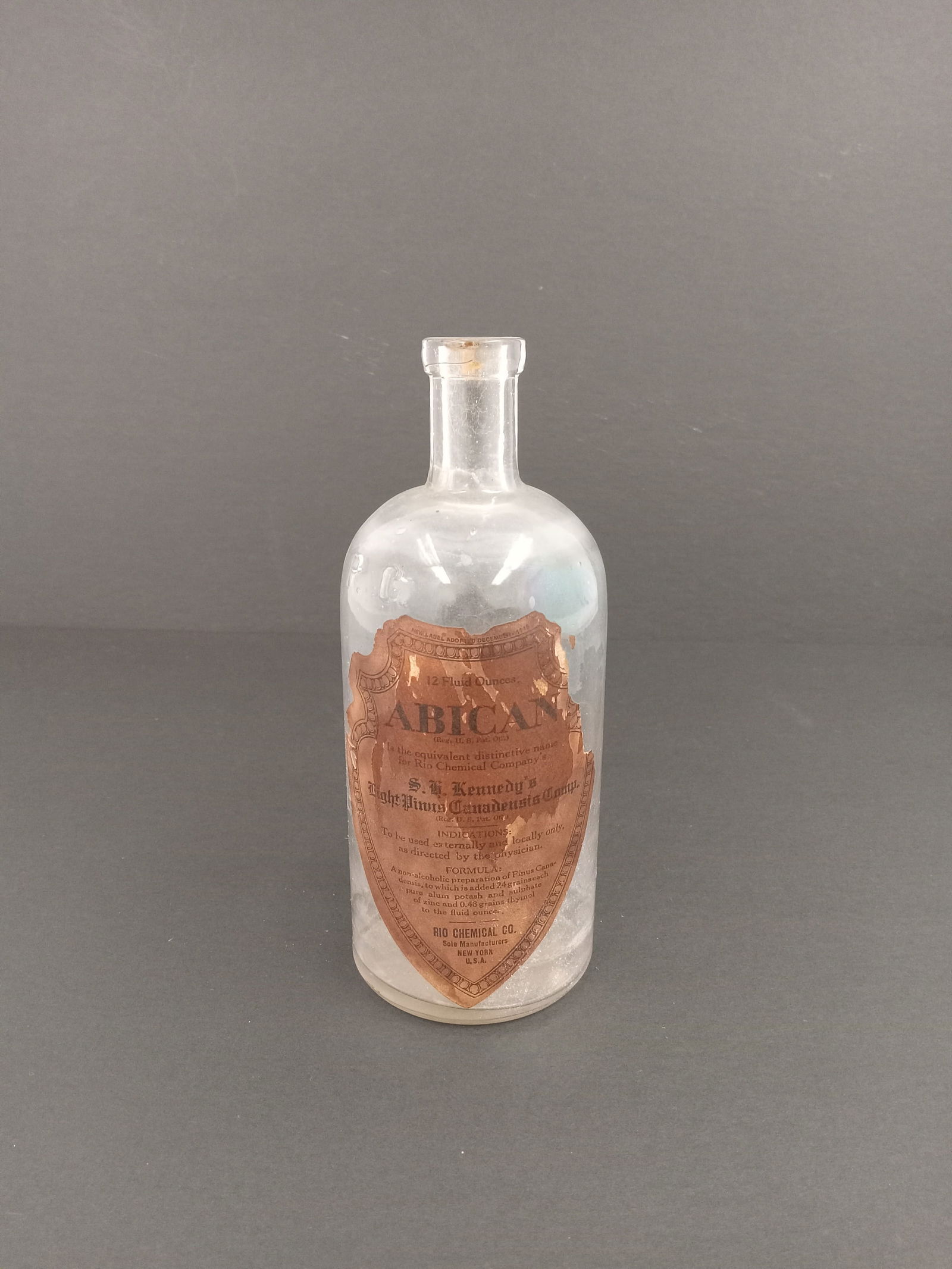 Antique Abican Canadensis Bottle (12 Fluid Ounces) Rio Chemical Co.: Antique Abican Canadensis Bottle (12 Fluid Ounces) Rio Chemical Co. 2.75" Width x 6.5" Height x 2.75" Depth
