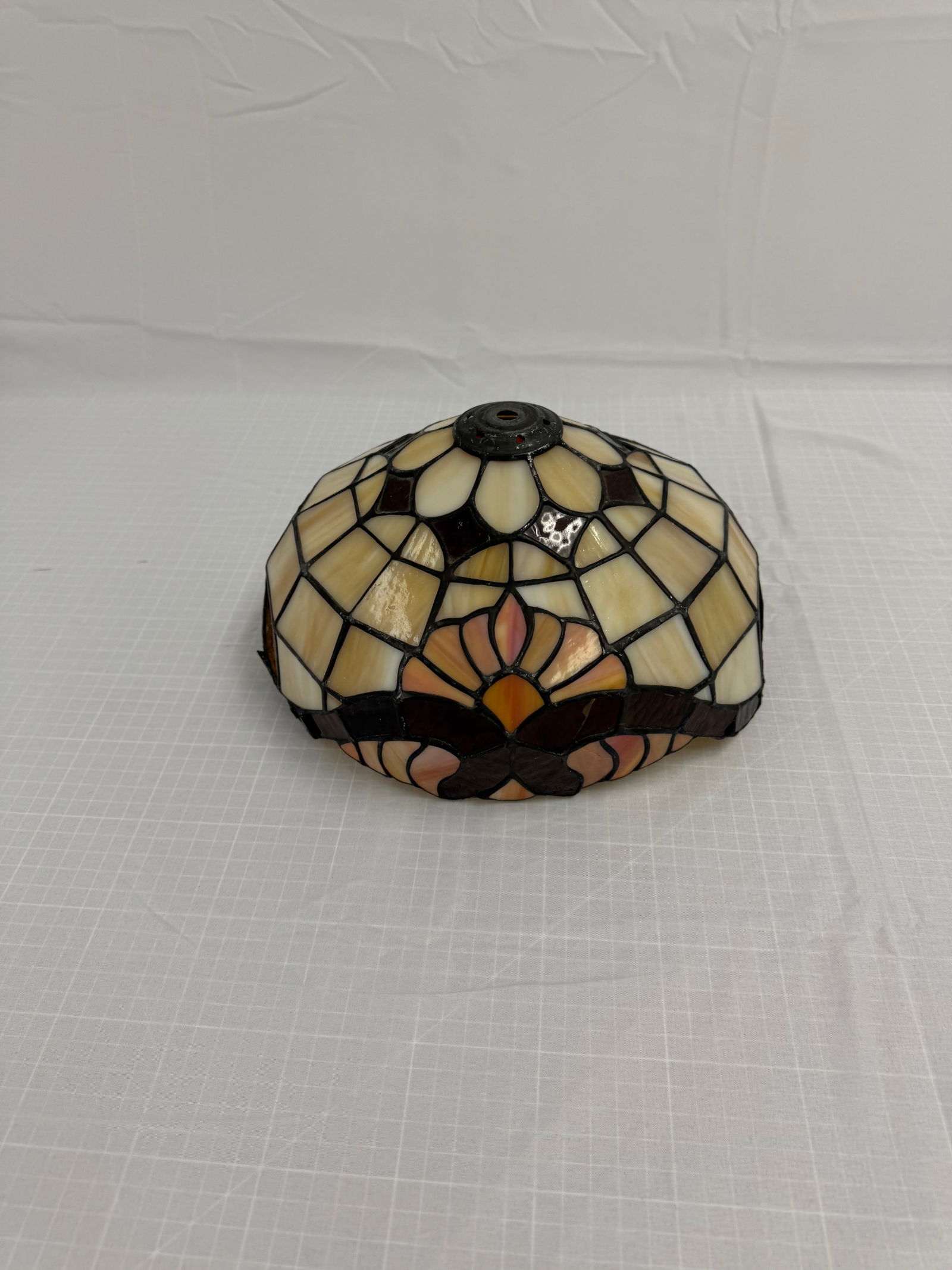 Vintage Tiffany Style Leaded Glass Lamp Shade: Vintage Tiffany Style Leaded Glass Lamp Shade featureing a mu,ticolor floral pattern in a round shape. This antique piece is handmade. The brand is unknown. Notice: There is a crack in one of the