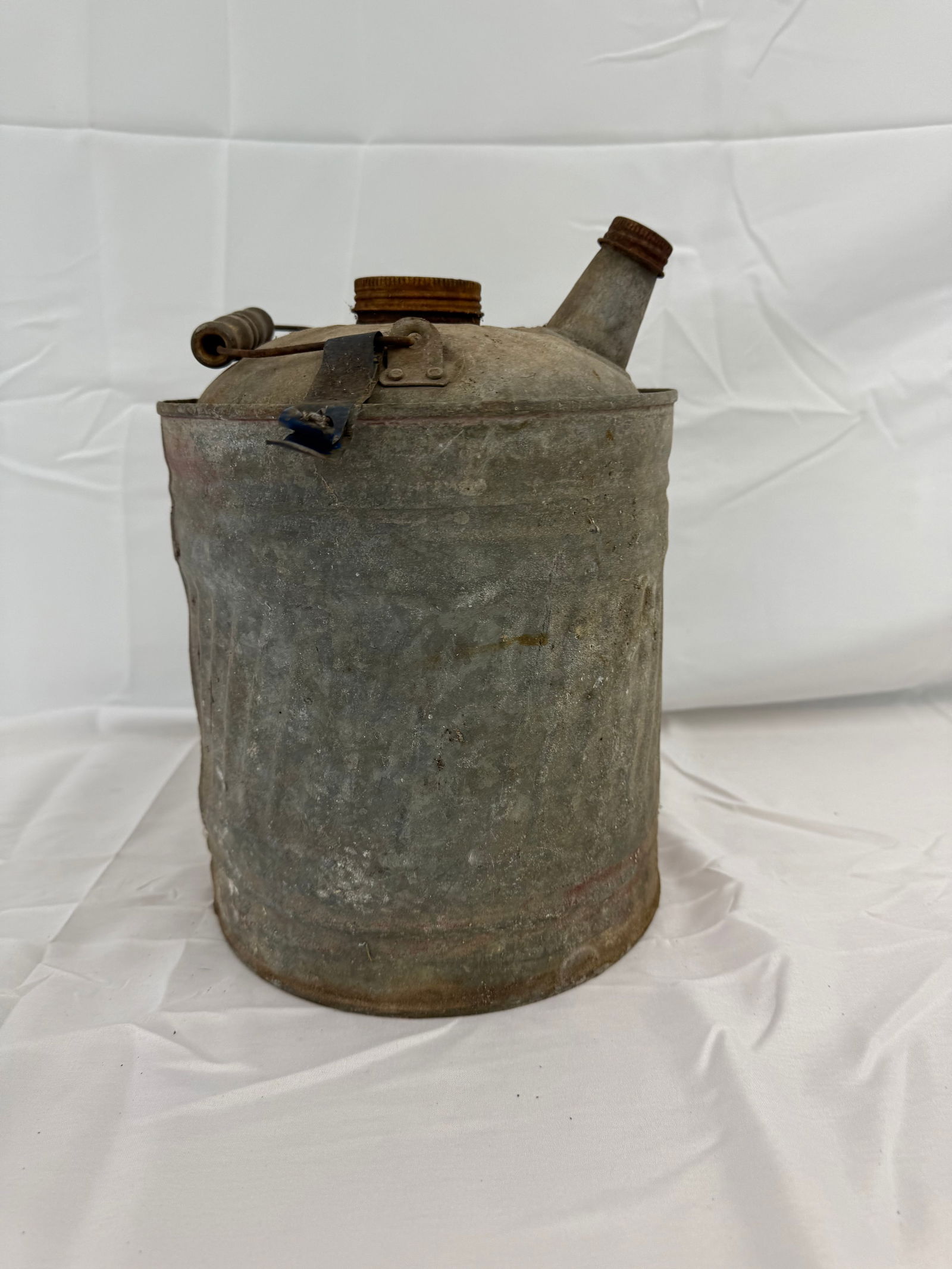 Antique Tin Gas Gallon Can: Tin Gas Can antique with caps and handles.