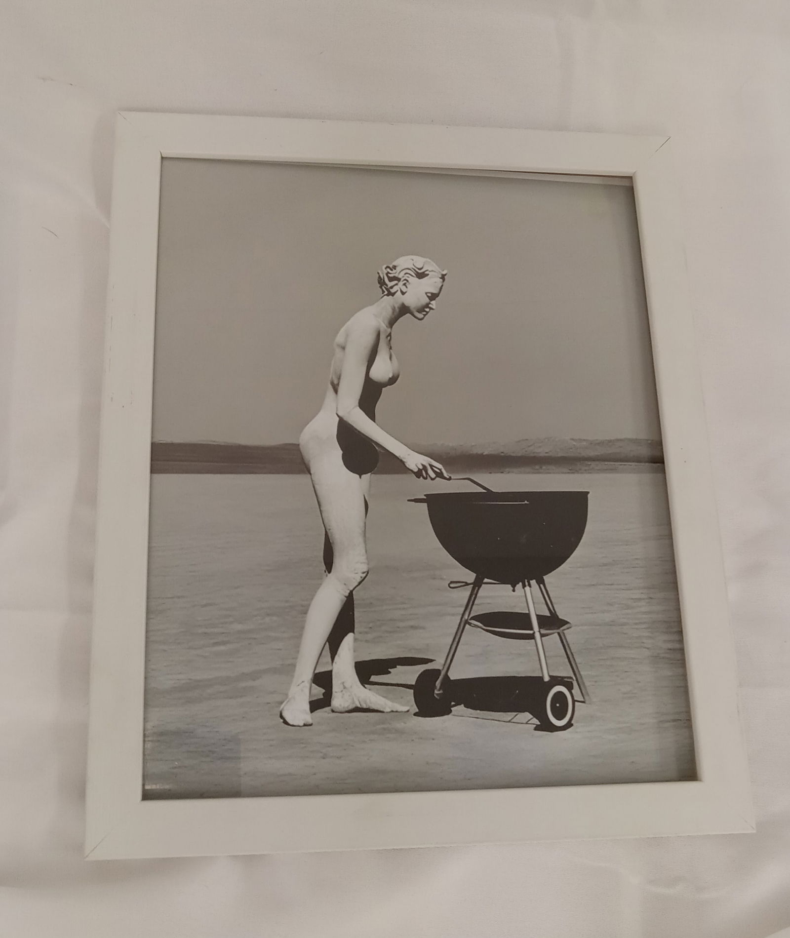 Herb Ritts "Stephanie with Barbecue, El Mirage, 1991," Print Framed: Herb Ritts "Stephanie with Barbecue, El Mirage, 1991," Print on high gloss Kodak photo paper. measures 8x10, framed.