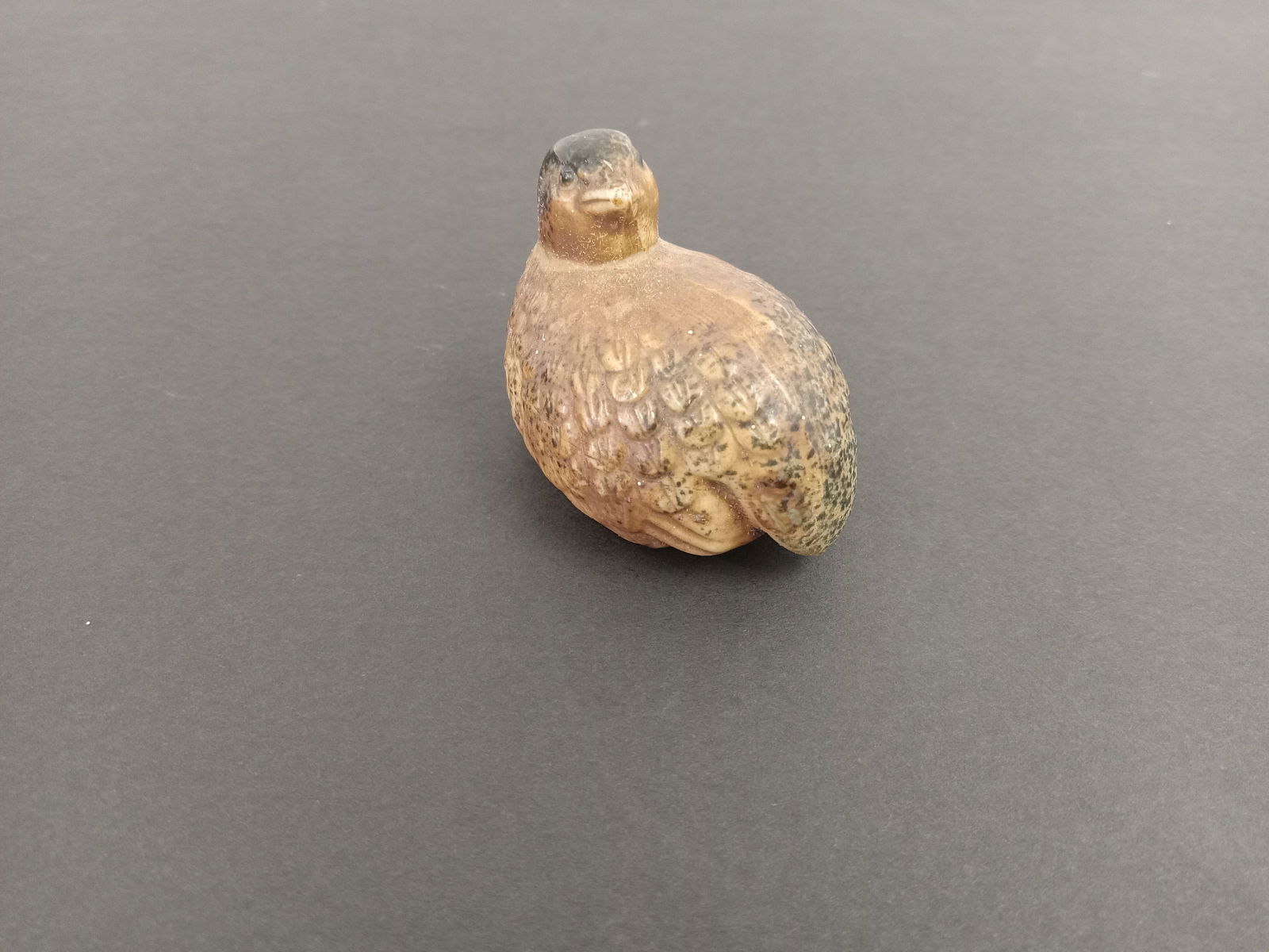 Small bird figurine: small bird figurine, unknown origin.