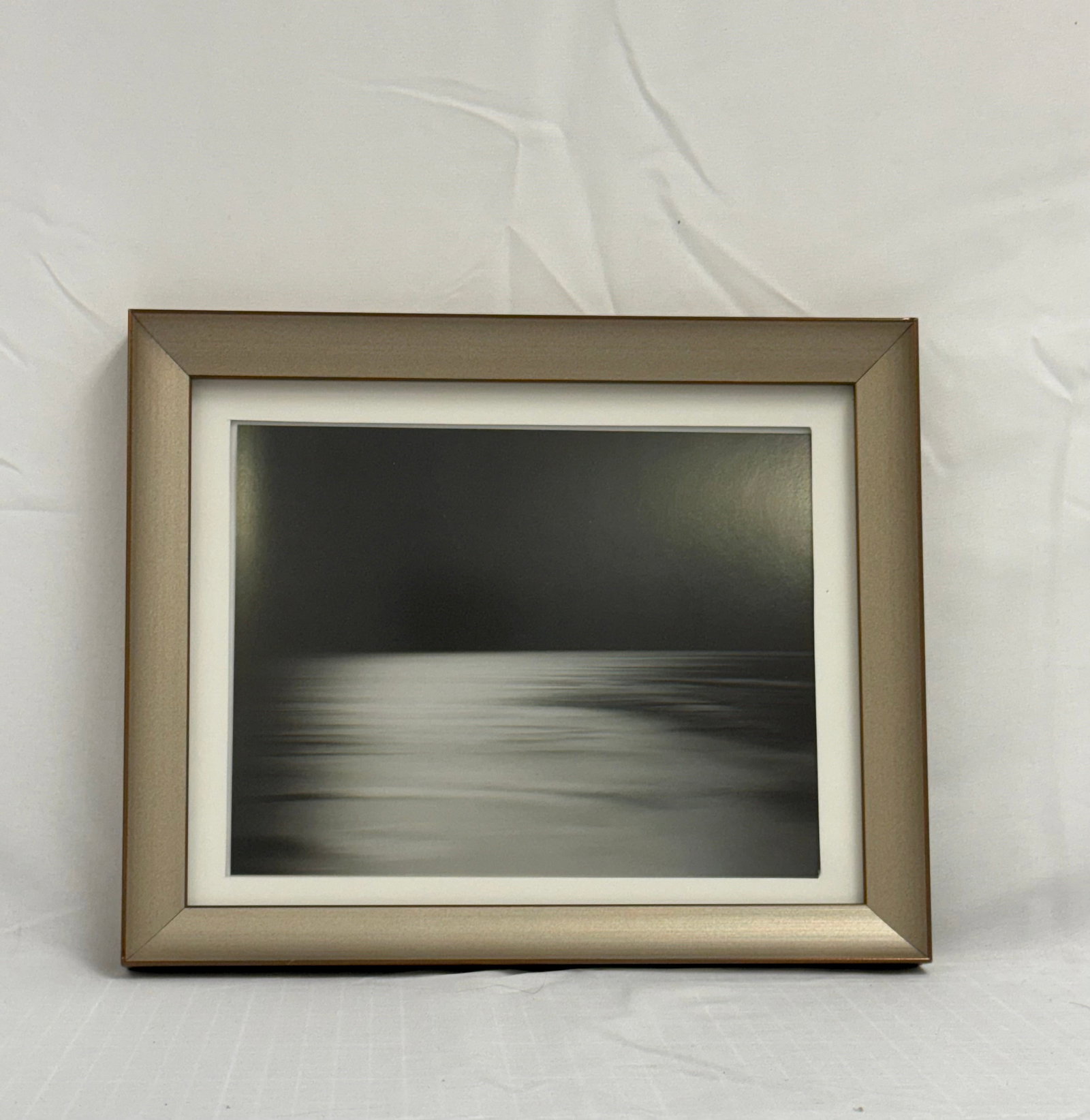 Hiroshi Sugimoto - Norwegian Sea, 1990 After: after Hiroshi Sugimoto - Norwegian Sea, 1990, measures 8.5 X 6.5 in, Framed. These are part of the estate sale and we do not have a COA. All lots offered in our auctions are sold strictly on an "AS IS