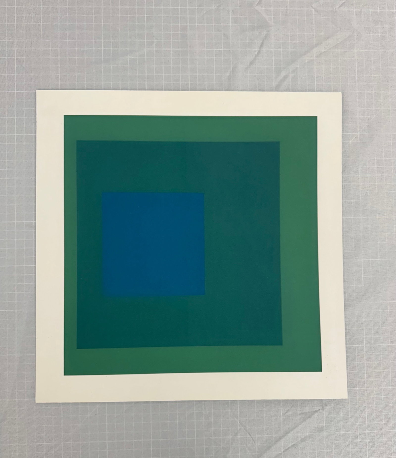 Josef Albers "Homage to the Square, Green": Josef Albers "Homage to the Square, Green" Mounted, Measures 14x14 in These are part of the estate sale and we do not have a COA. All lots offered in our auctions are sold strictly on an "AS IS" basis