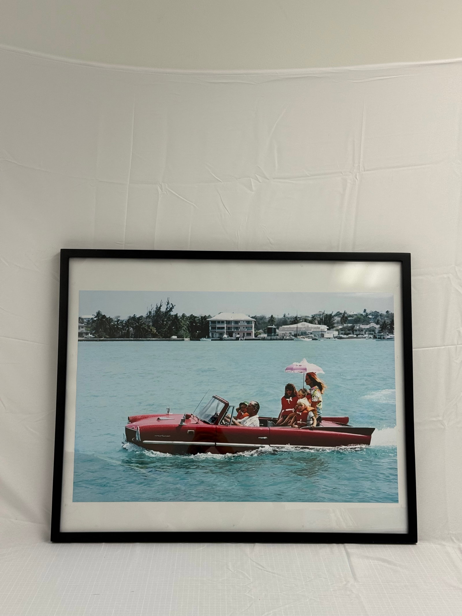 Slim Aarons "Sea Drive, 1967" Framed: Slim Aarons "Sea Drive, 1967". ON Kodak photo paper. measures 19 in X 28 in. Framed. These are part of the estate sale and we do not have a COA. All lots offered in our auctions are sold strictly on