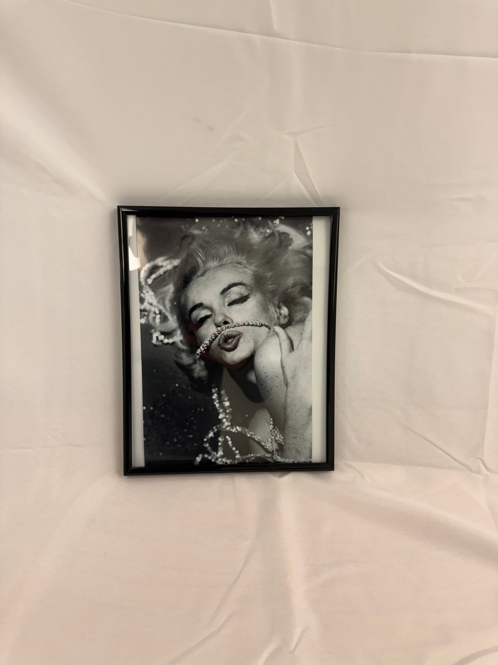 BERT STERN: MARILYN MONROE KISS RHINESTONES: BERT STERN: MARILYN MONROE KISS RHINESTONES. Image: 8x10 inches on Kodak photo paper. In June 1962, photographer Bert Stern shot a series of photos of Marilyn Monroe at the Hotel Bel-Air that have col