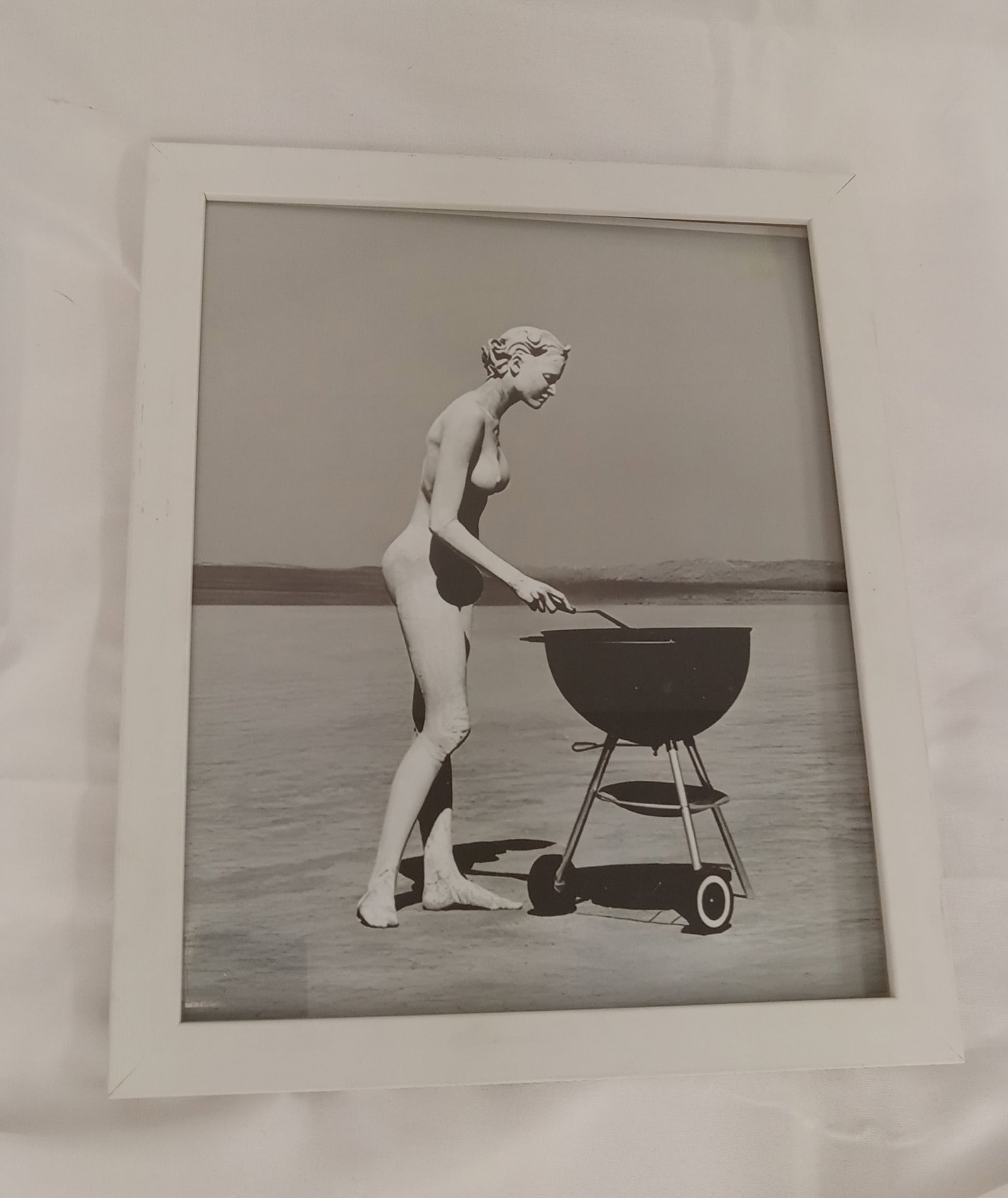 Herb Ritts "Stephanie with Barbecue, El Mirage, 1991," Print Framed after: Herb Ritts "Stephanie with Barbecue, El Mirage, 1991," Print. photoprint on kodak photopaper, framed, measures 8x10. These are part of the estate sale and we do not have a COA. All lots offered in