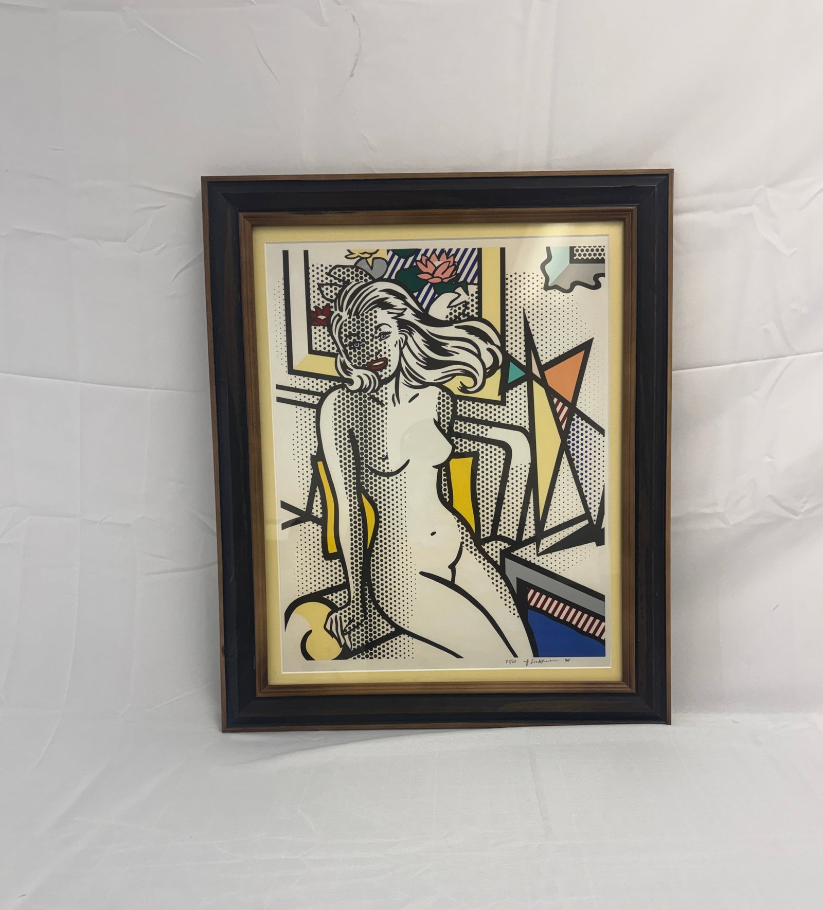 after Roy Lichtenstein "Nude with Yellow Pillow" Offset Lithograph: after Roy Lichtenstein "Nude with Yellow Pillow", on heavy wove paper, measures 15 X 20 inches, sold after. Framed. Sight measures 15x18 inches. These are part of the estate sale and we do not have a 