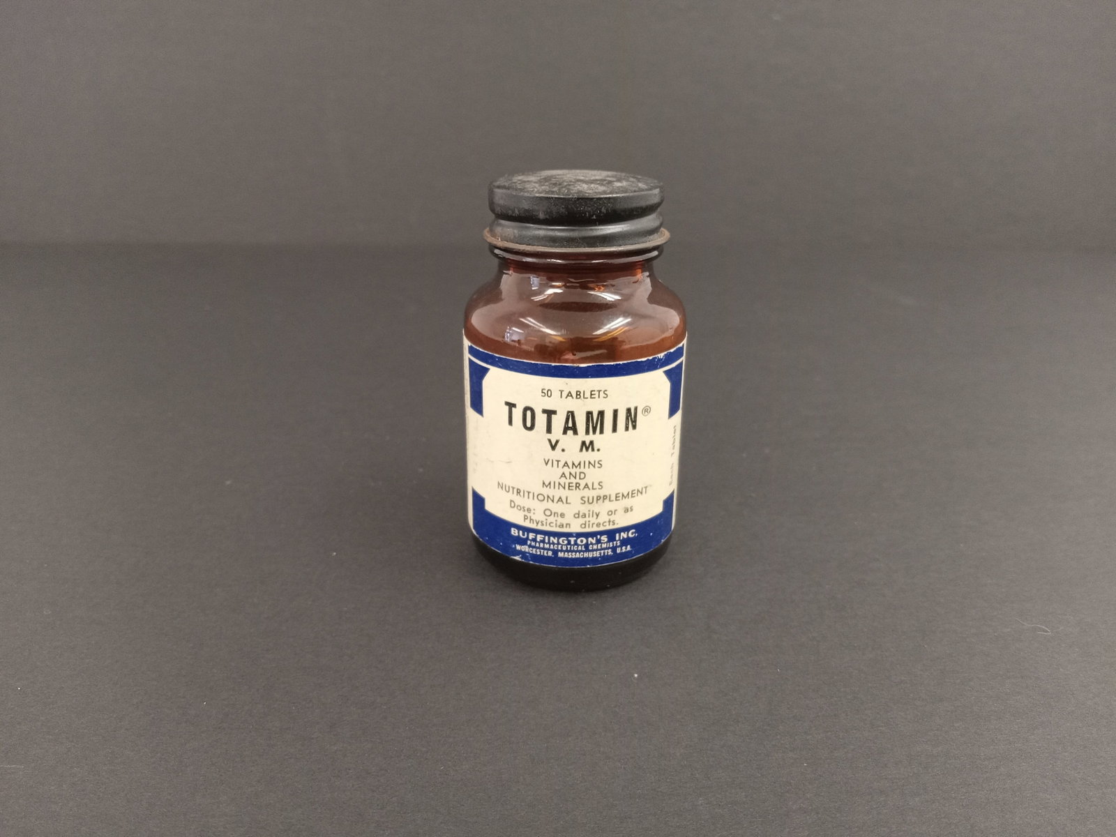 Antique Totamin V. M. Vitamin Bottle: Totamin Vitamin bottle AntiqueThese are part of the estate sale and we do not have a COA. All lots offered in our auctions are sold strictly on an "AS IS" basis. Any descriptions regarding an item’s