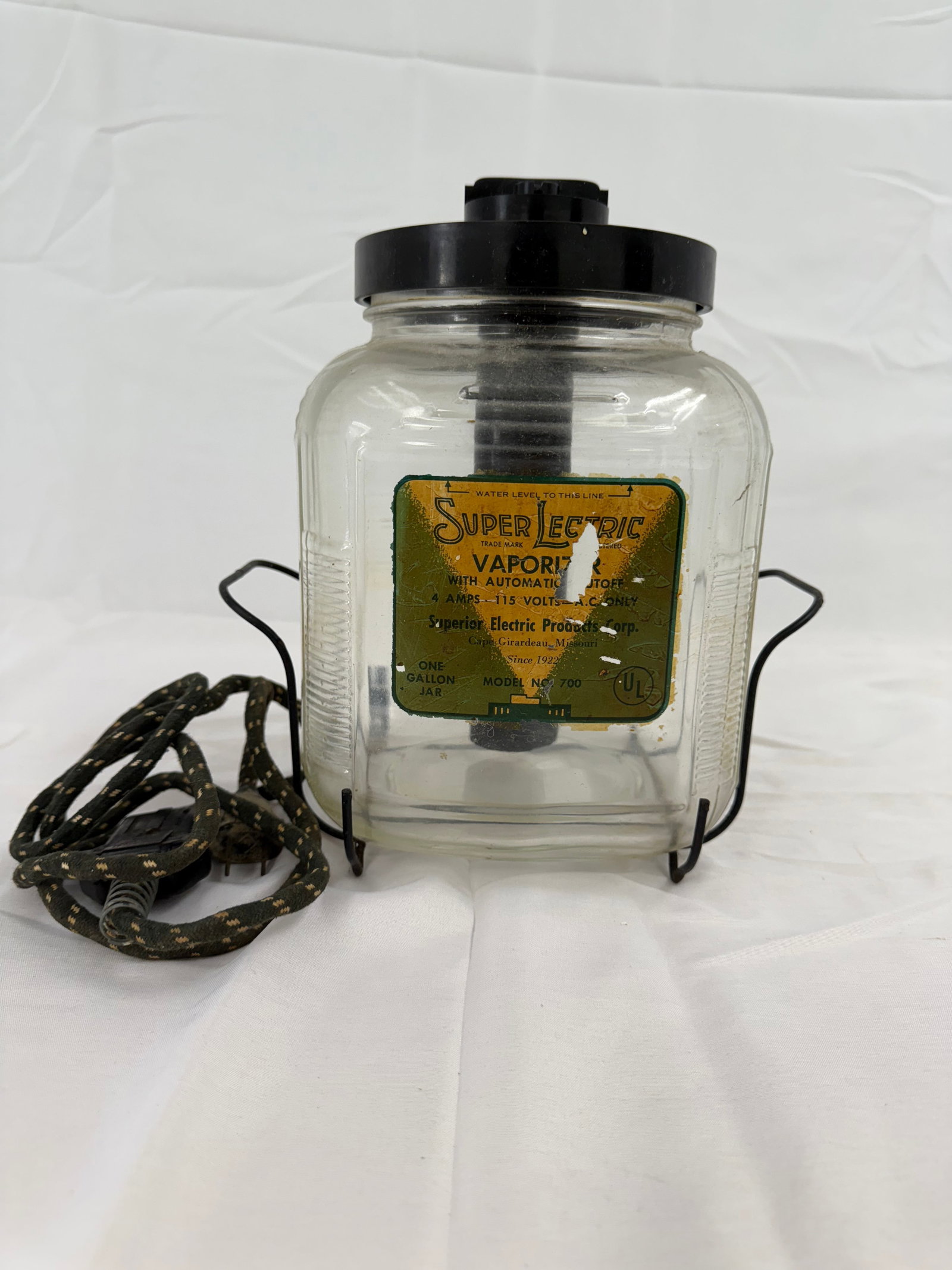 Vintage Super Lectric Vaporizer: Antique Auto off One Gallon Jar vaporizer by Super Electric These are part of the estate sale and we do not have a COA. All lots offered in our auctions are sold strictly on an "AS IS" basis. Any desc