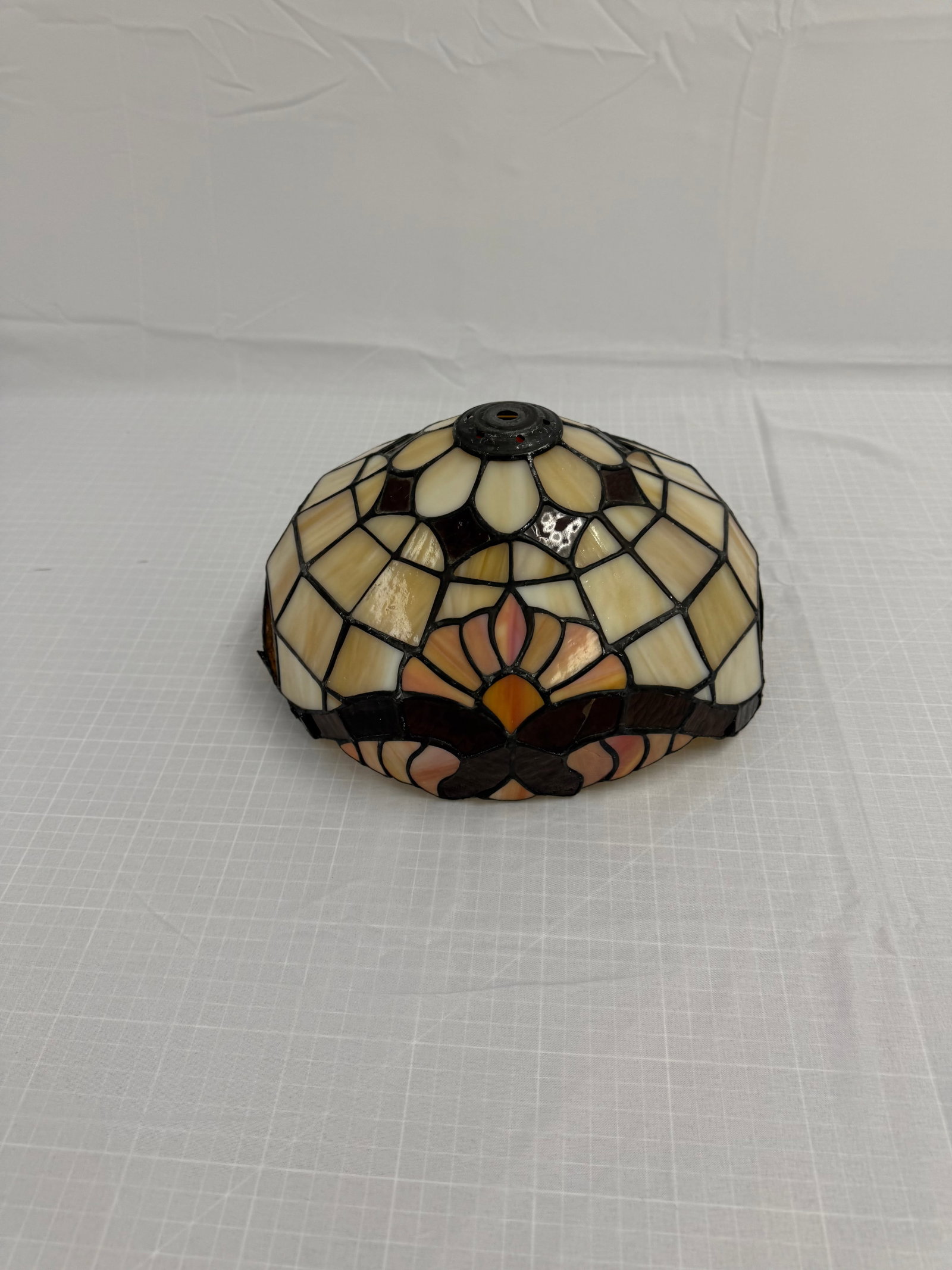 Vintage Tiffany Style Leaded Glass Lamp Shade: Vintage Tiffany Style Leaded Glass Lamp Shade featureing a mu,ticolor floral pattern in a round shape. This antique piece is handmade. The brand is unknown. Notice: There is a crack in one of the glas