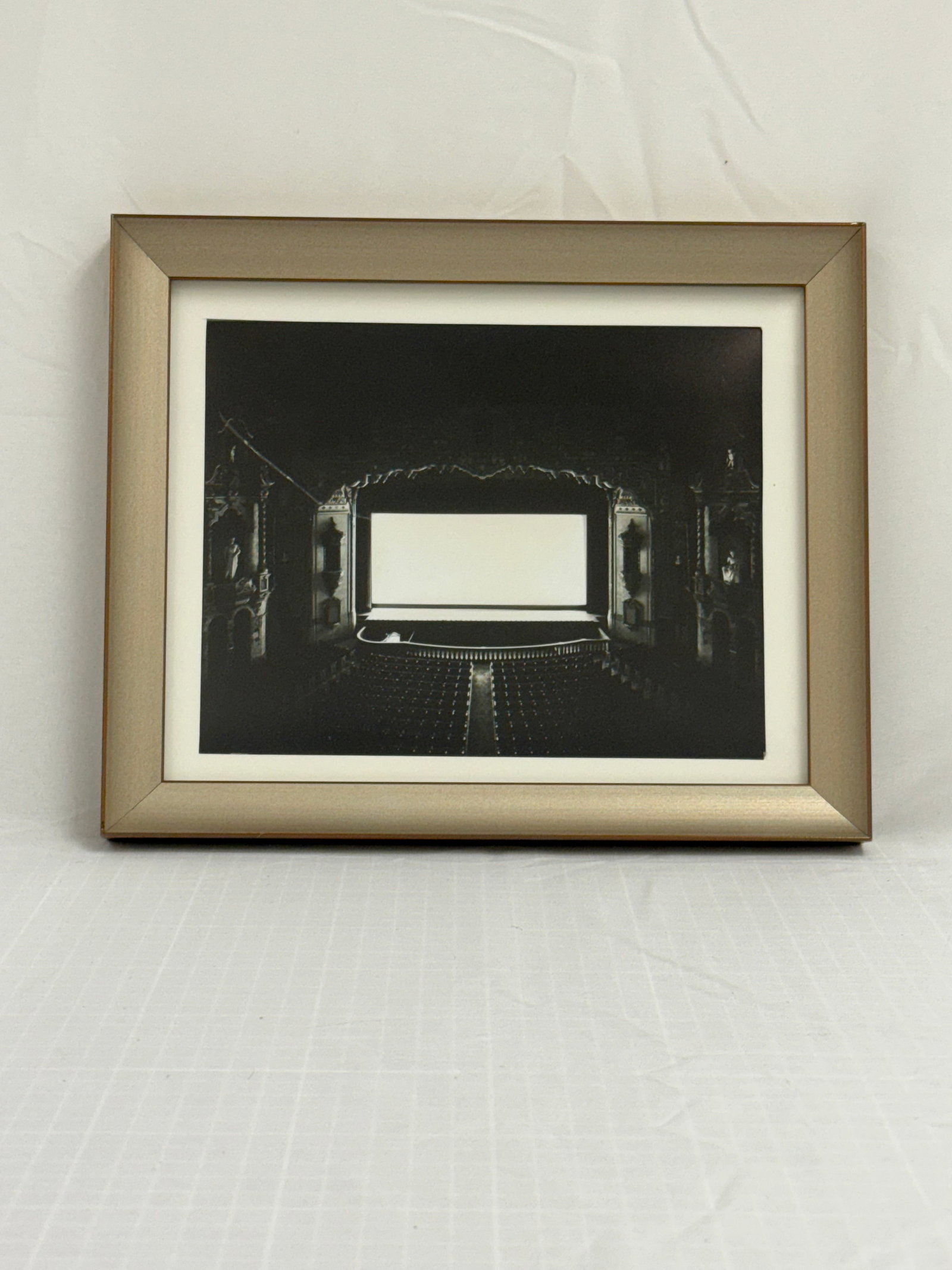 Hiroshi Sugimoto - Akron Civic, Ohio, 1980 after: Hiroshi Sugimoto - Akron Civic, Ohio, 1980, measures 8.5 X 6.5 in, Framed These are part of the estate sale and we do not have a COA. All lots offered in our auctions are sold strictly on an "AS IS" b