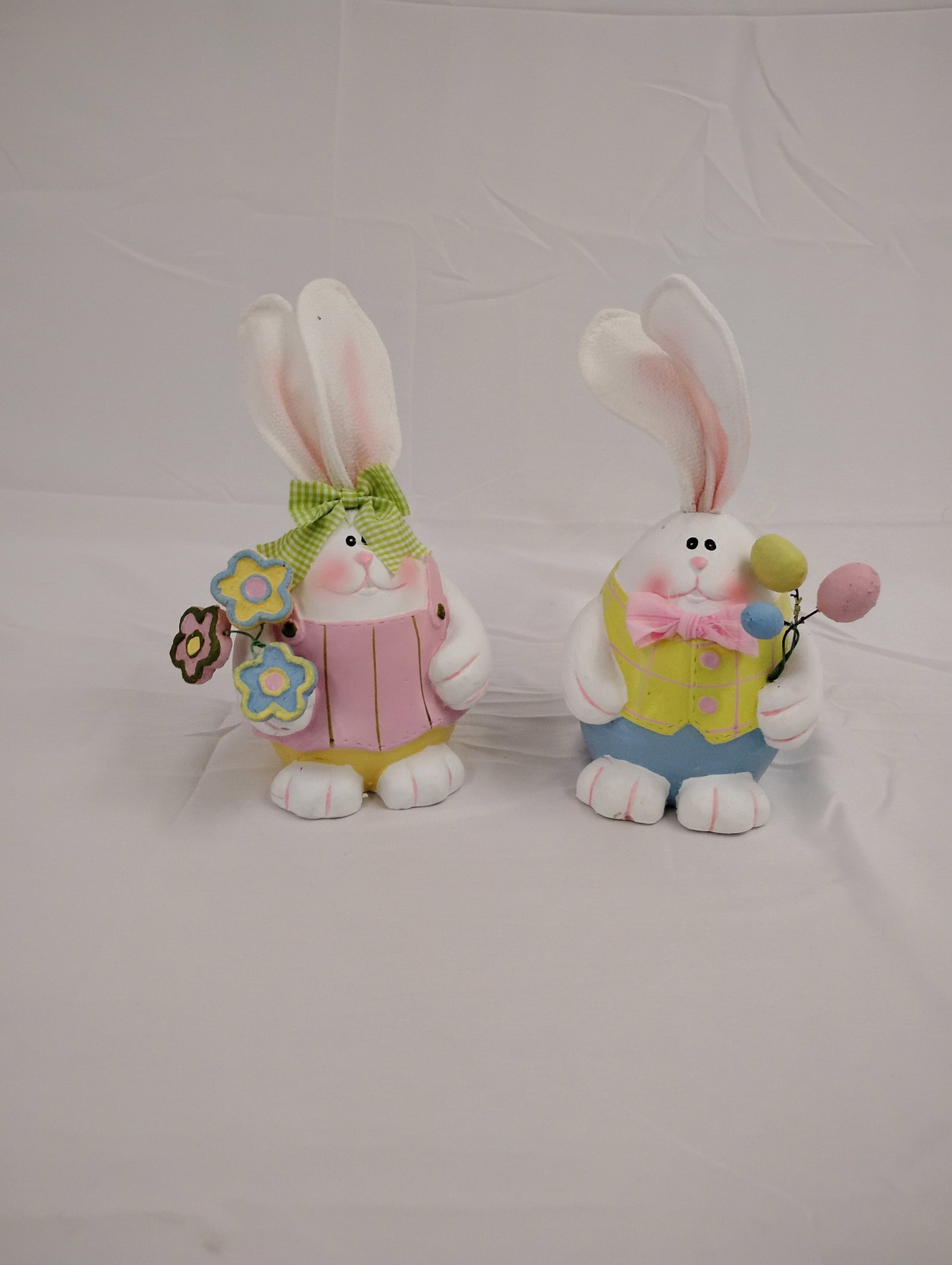 2 Bunny Easter Figurines: Easter bunny figurines. These are part of the estate sale and we do not have a COA. All lots offered in our auctions are sold strictly on an "AS IS" basis. Any descriptions regarding an item’s