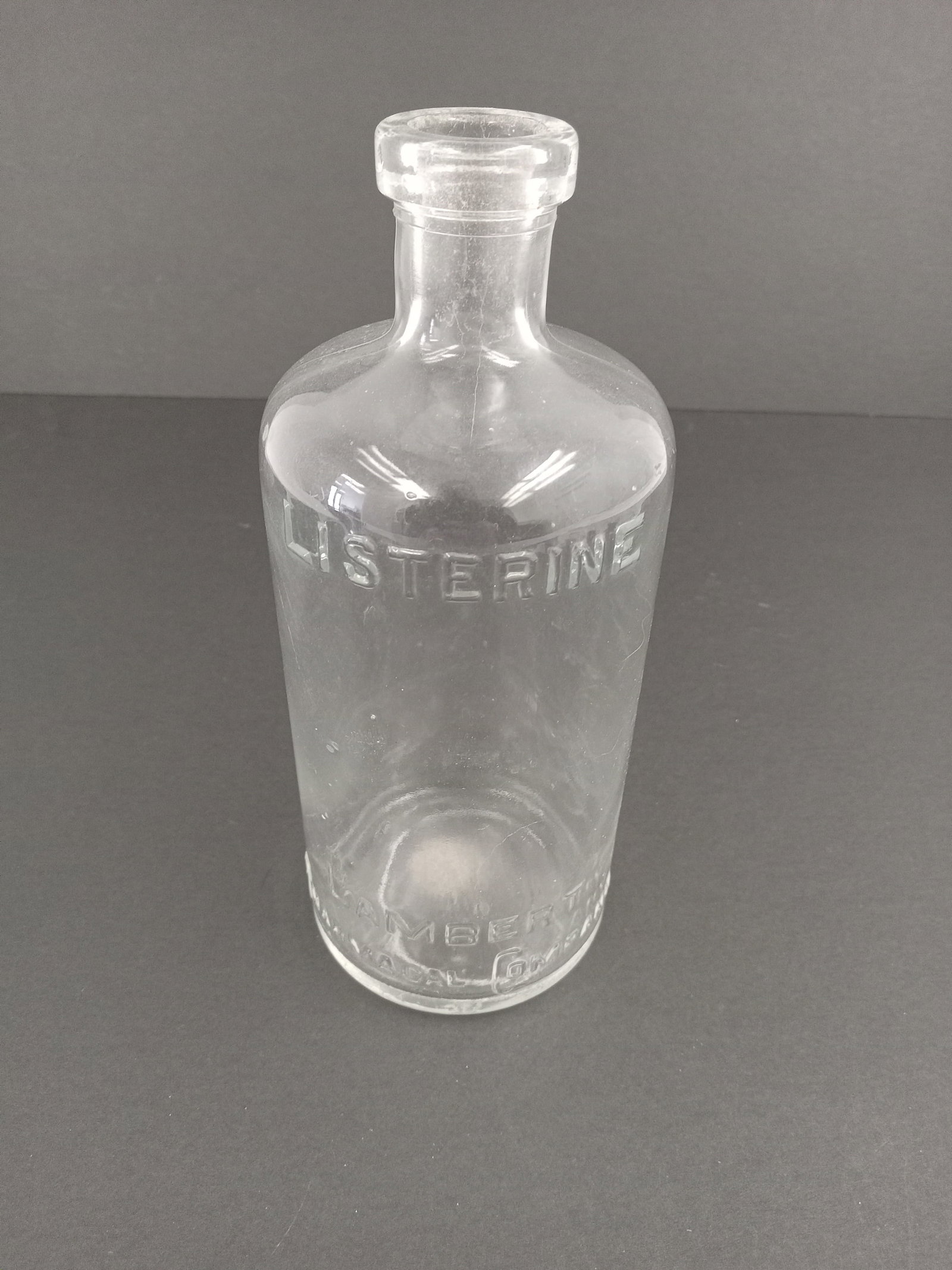 Antique Glass Listerine Bottle: Glass Listerine Bottle Vintage These are part of the estate sale and we do not have a COA. All lots offered in our auctions are sold strictly on an "AS IS" basis. Any descriptions regarding an