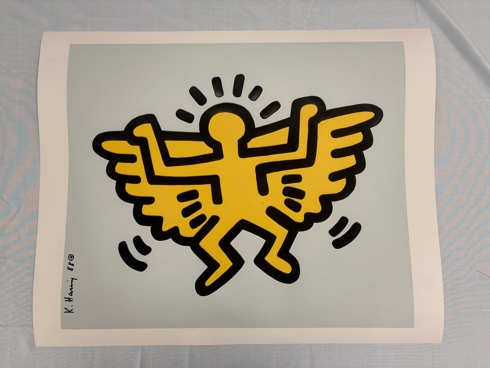 Keith Haring "Angel" sold after: Keith Haring "Angel", on heavy wove paper,measures 23x27 inches, ssold after These are part of the estate sale and we do not have a COA. All lots offered in our auctions are sold strictly on an "AS IS