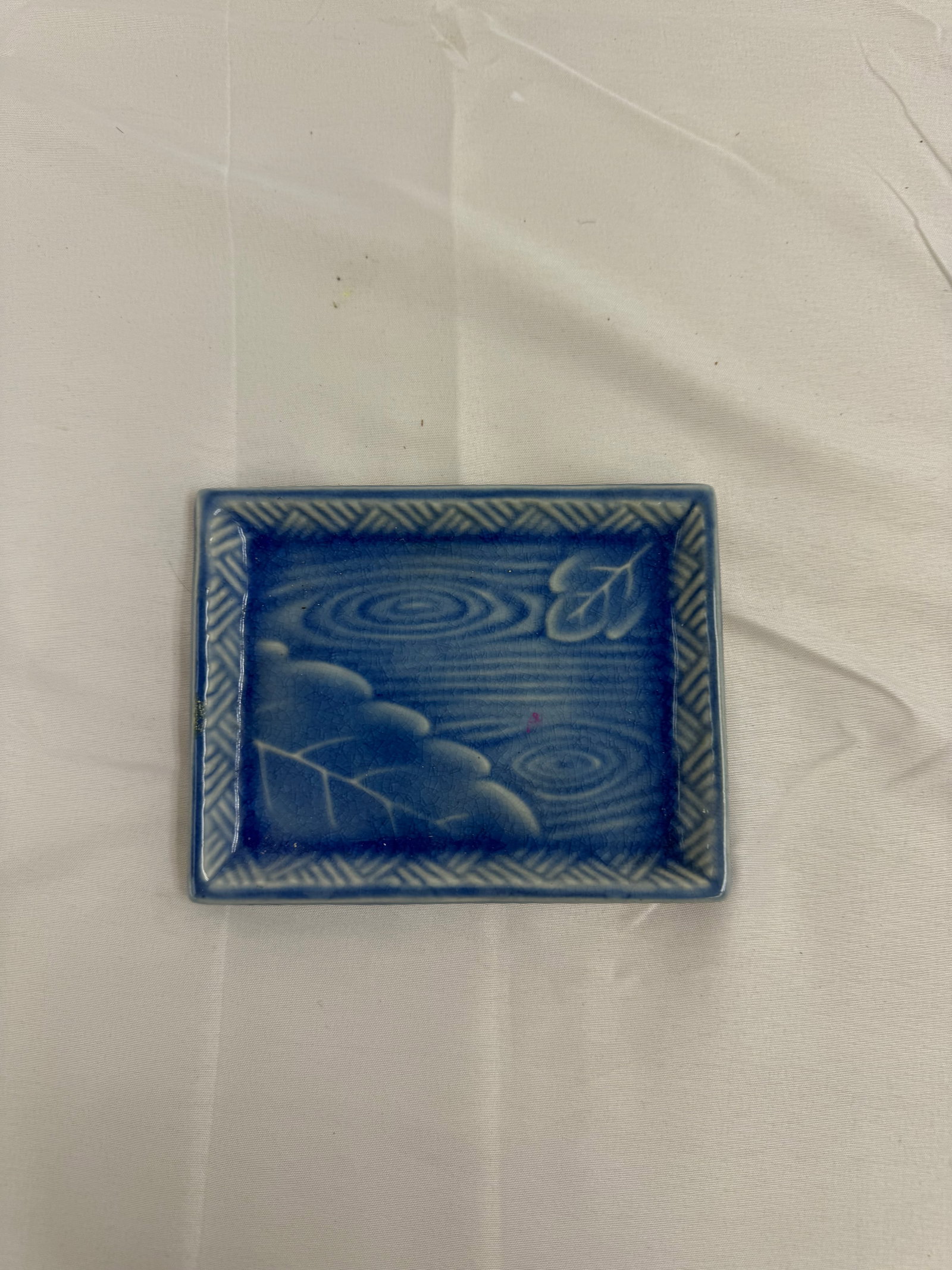 Vintage Kotubuki Ceramic Tray: Small ceramic tray by Kotubuki Made in Japan. Hand crafted. Measures 4x3.5inches.These are part of the estate sale and we do not have a COA. All lots offered in our auctions are sold strictly on an "A