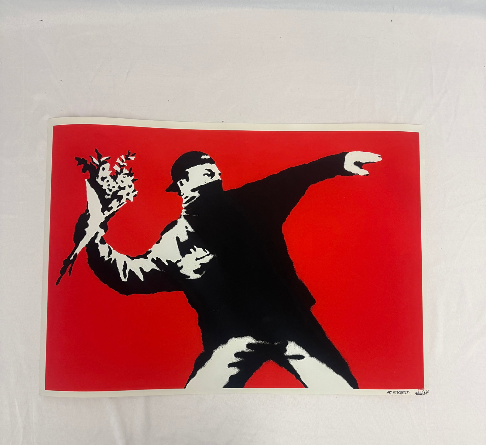 BANKSY (Love is in the Air) after: BANKSY (Love is in the Air) after, Print in colours, 2003, on heavy wove paper. Measures 27.00 X 19.00 Inches.These are part of the estate sale and we do not have a COA. All lots offered in our auctio