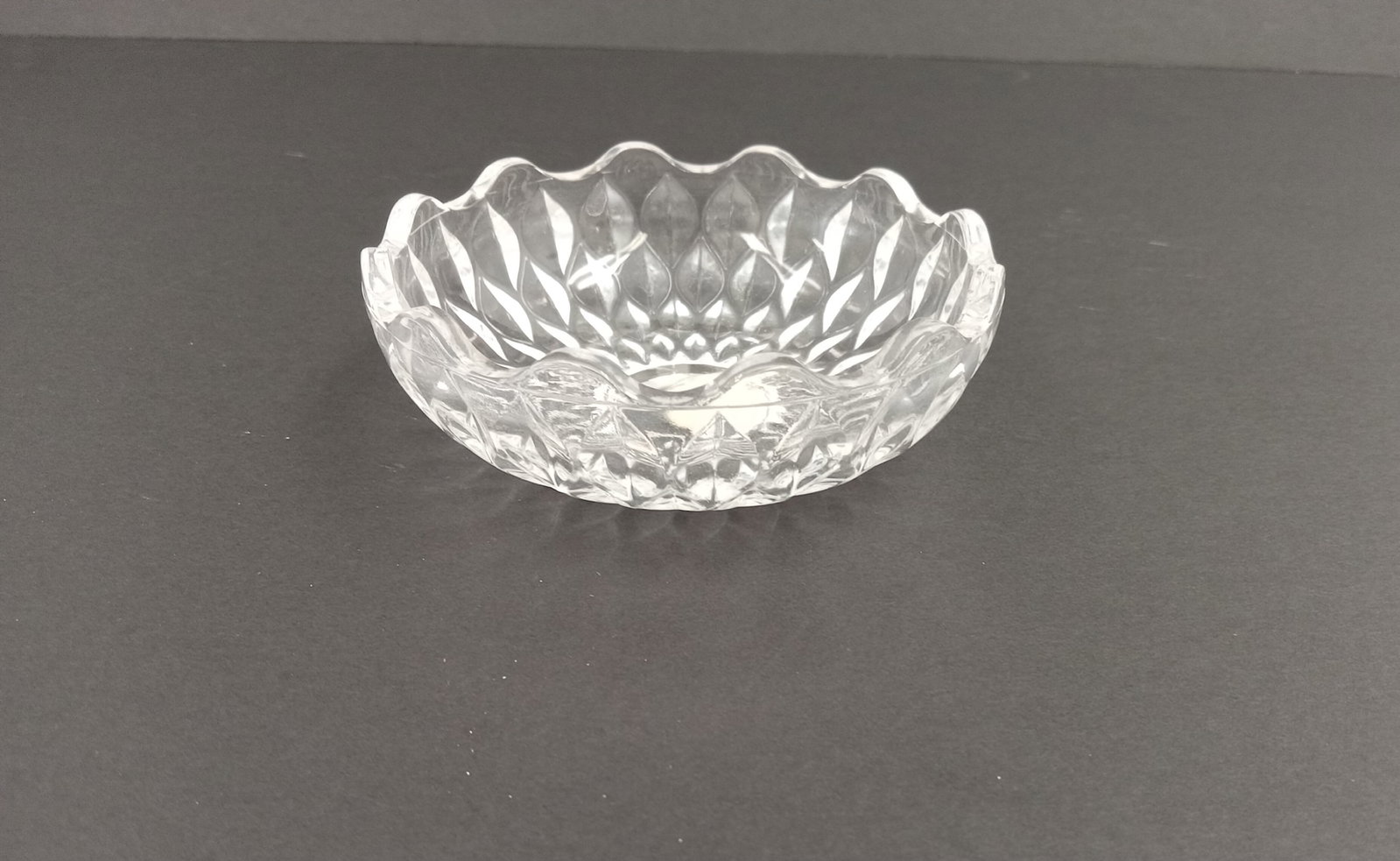 Small Crystal Ash Tray: 3x3x.5 inch Crystal Ash Tray or small bowl These are part of the estate sale and we do not have a COA. All lots offered in our auctions are sold strictly on an "AS IS" basis. Any descriptions