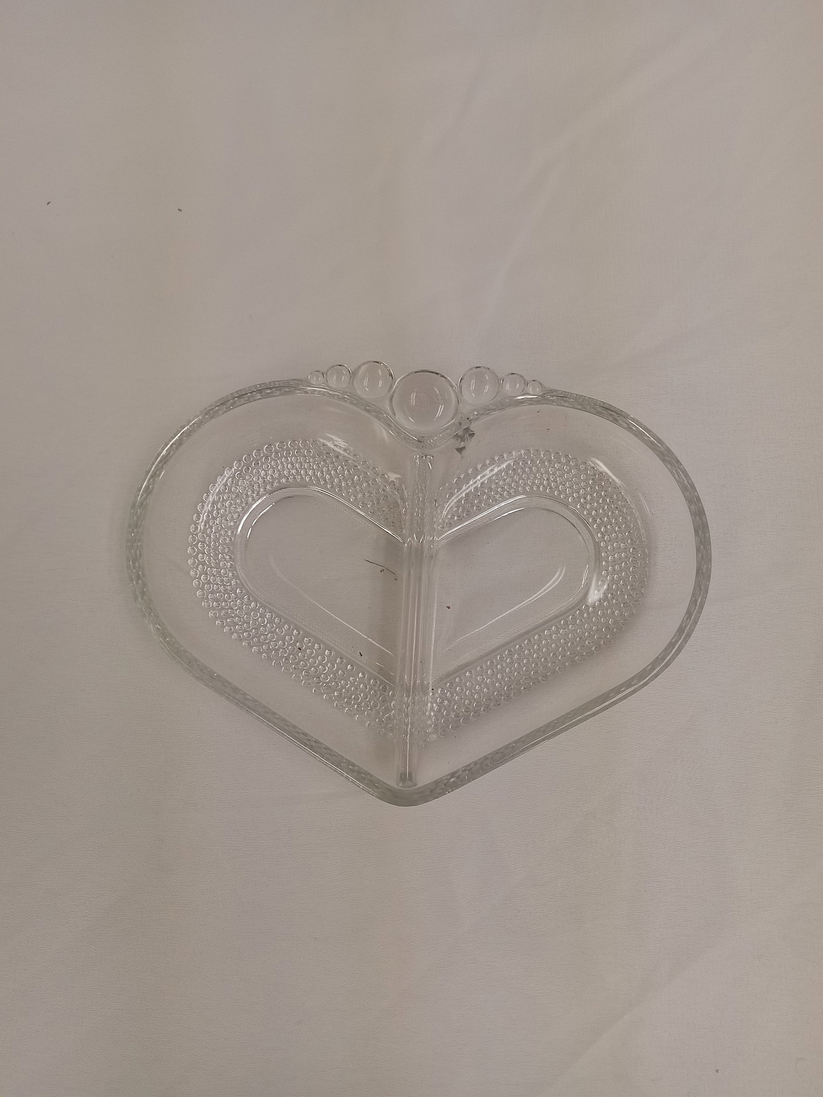 Heart Shaped Dish with divider: Heart Shaped Dish with divider These are part of the estate sale and we do not have a COA. All lots offered in our auctions are sold strictly on an "AS IS" basis. Any descriptions regarding an item’