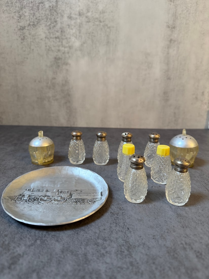Mixed Lot - Vintage Salt & Pepper Shakers, Small Train Dish, Silver-Topped Shakers: A mixed lot of vintage tableware items including salt and pepper shakers with various materials and a decorative small dish.Included in this lot:Two larger dome-shaped salt and pepper shakers with