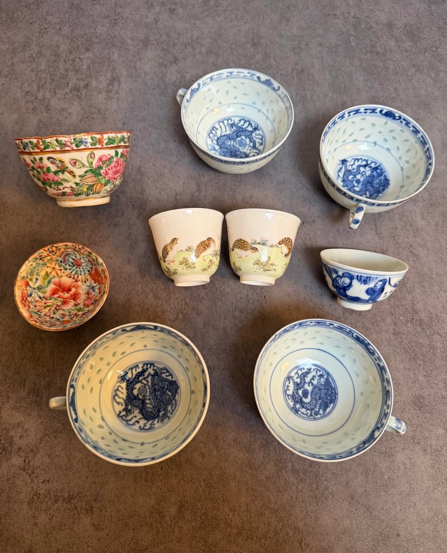 Group of Chinese Porcelain Cups and Bowls, Blue and White and Polychrome: Group of assorted Chinese porcelain cups and small bowls, including:_ Several blue and white cups with dragon motifs and dotted interior decoration_ Two small polychrome cups with bird decoration_ A