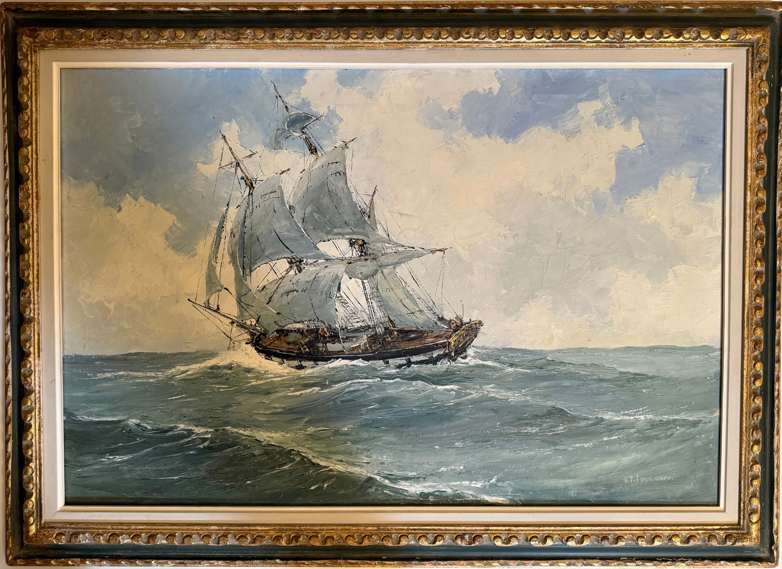 A.T. Louwaard Seascape Oil on Canvas Painting: European maritime seascape oil on canvas depicting a sailing vessel navigating open waters under a dramatic sky, signed A.T. Louwaard lower right.Verso with typed biographical label noting the artist